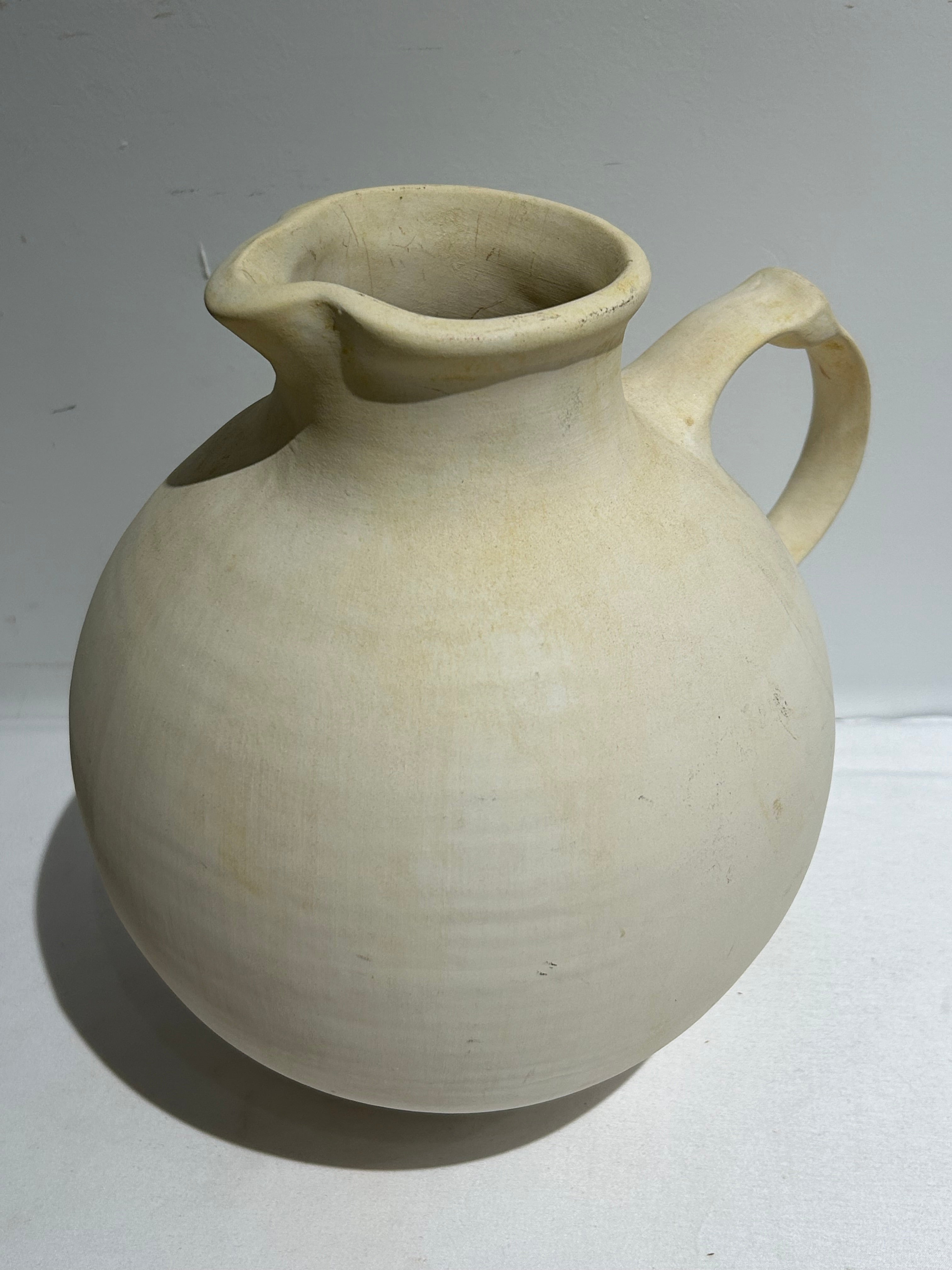 Vintage handled ceramic pitcher
