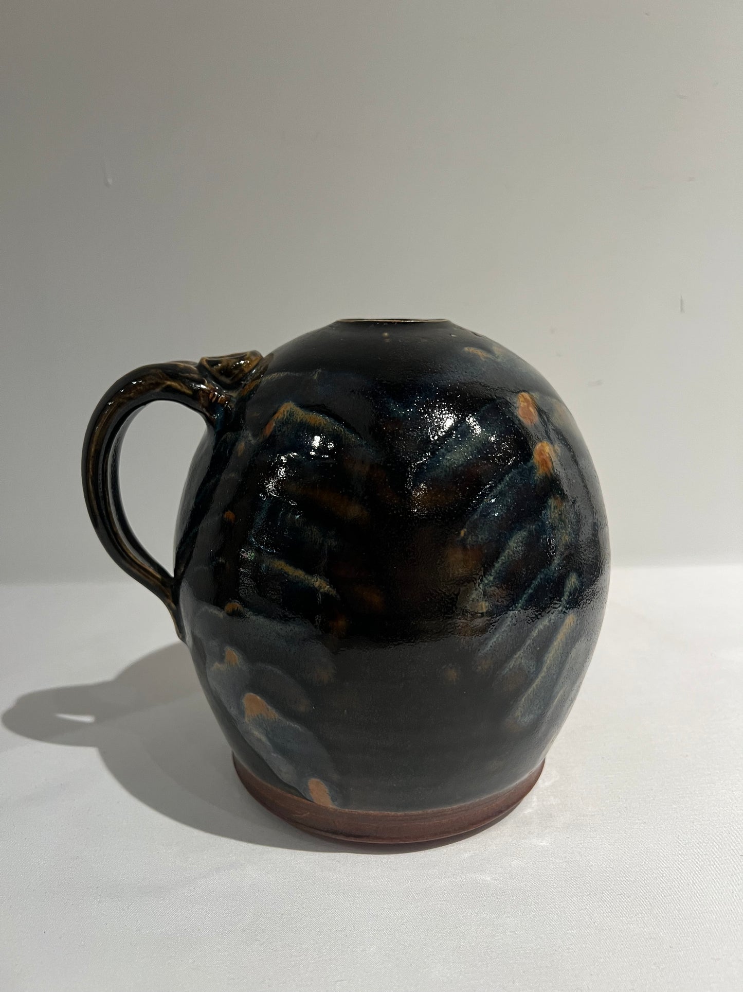 Ceramic vessel with handle