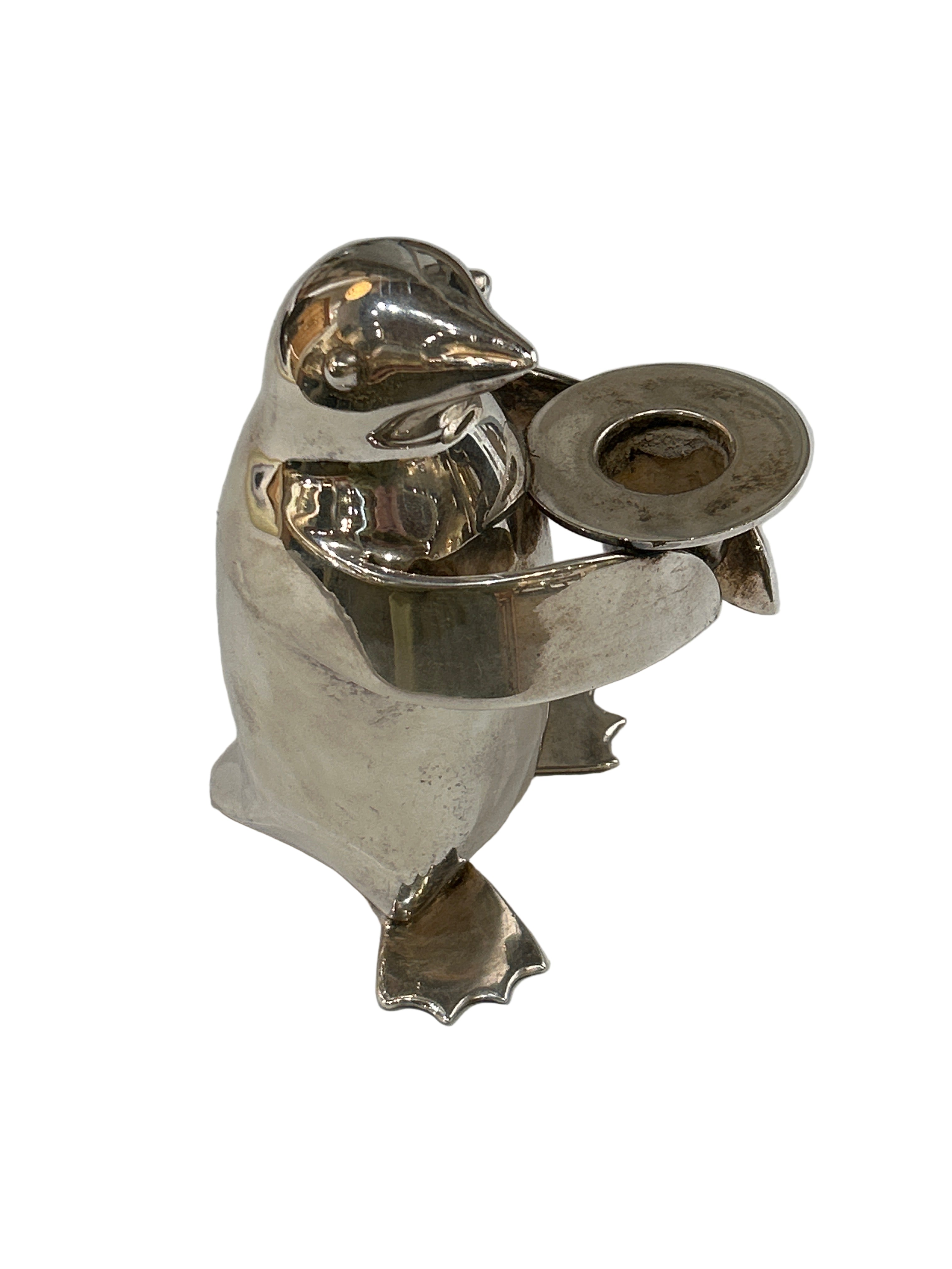 Vintage metal penguin candleholder
