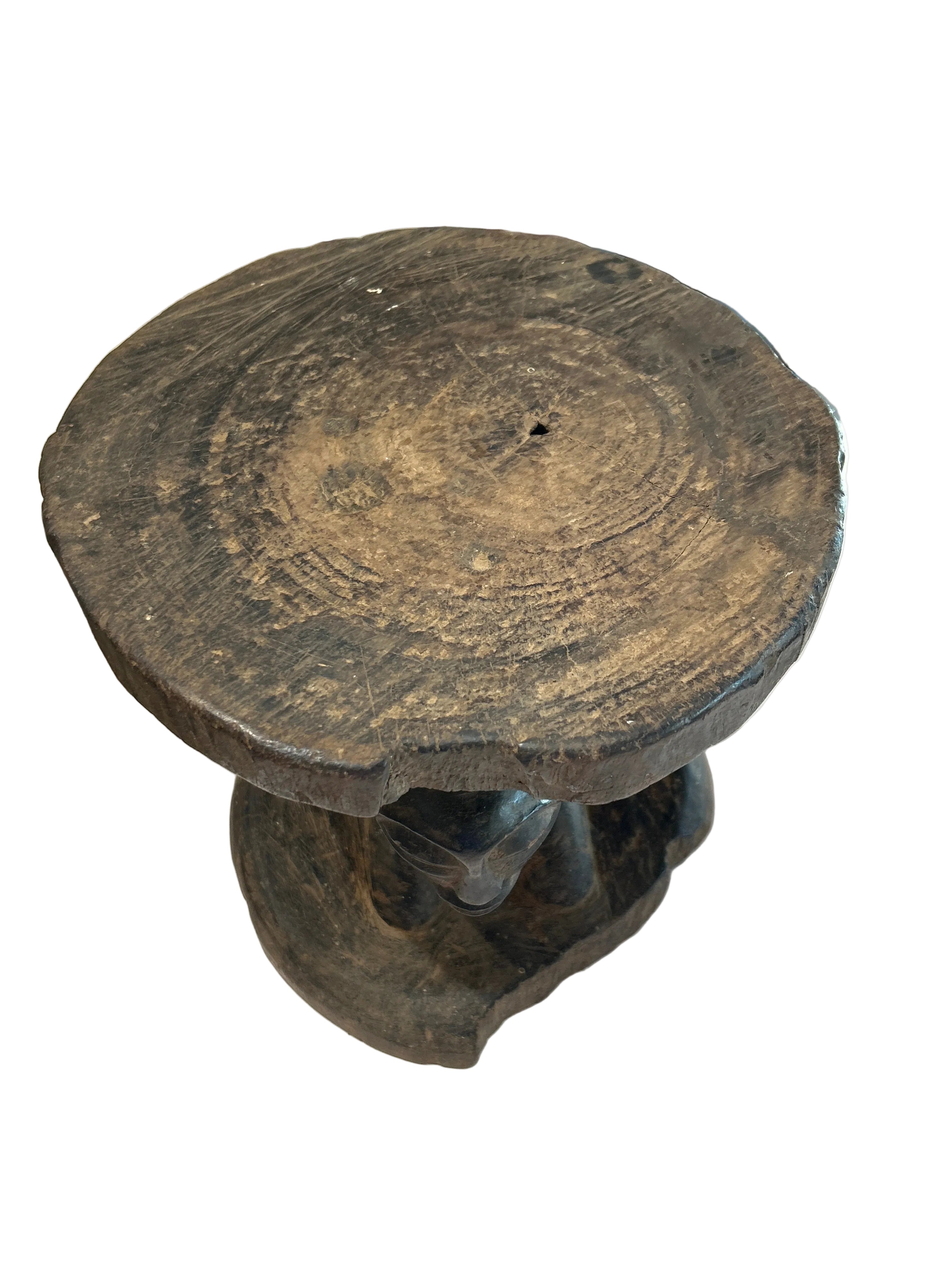 Vintage hand carved African stool sm
