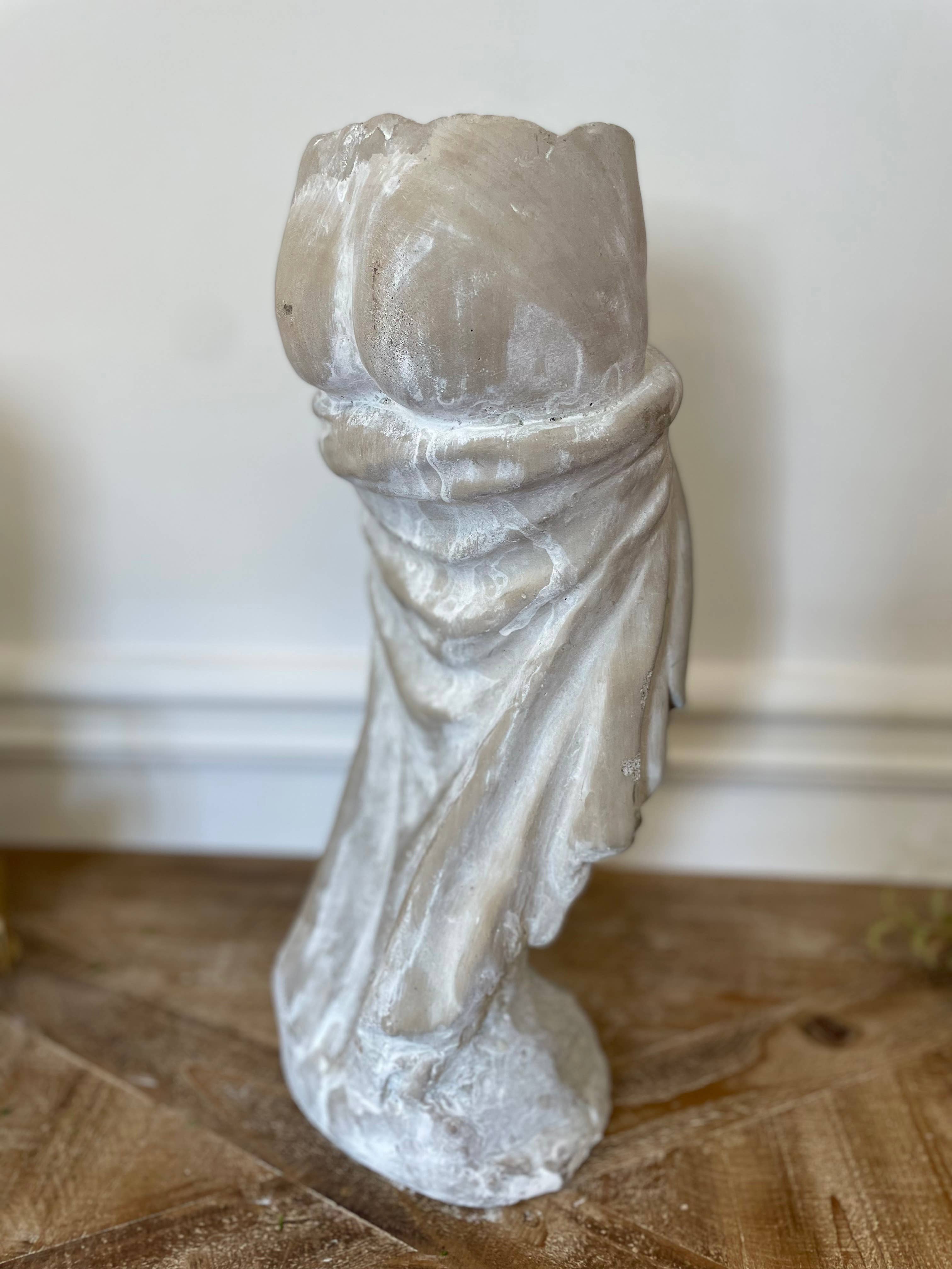 Cement female statue