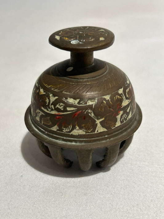 Ornate brass prayer claw bell