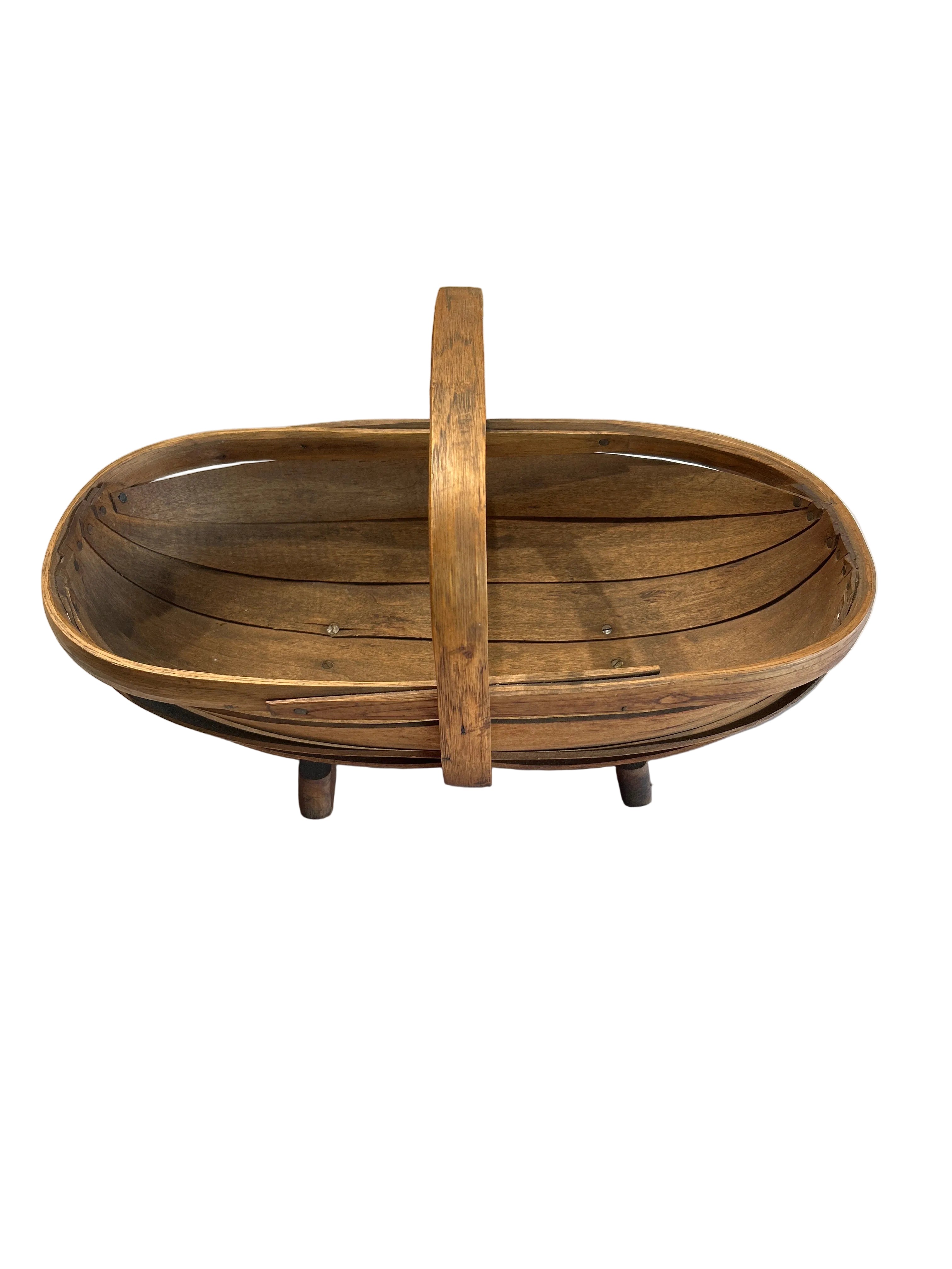 Vintage footed wood basket