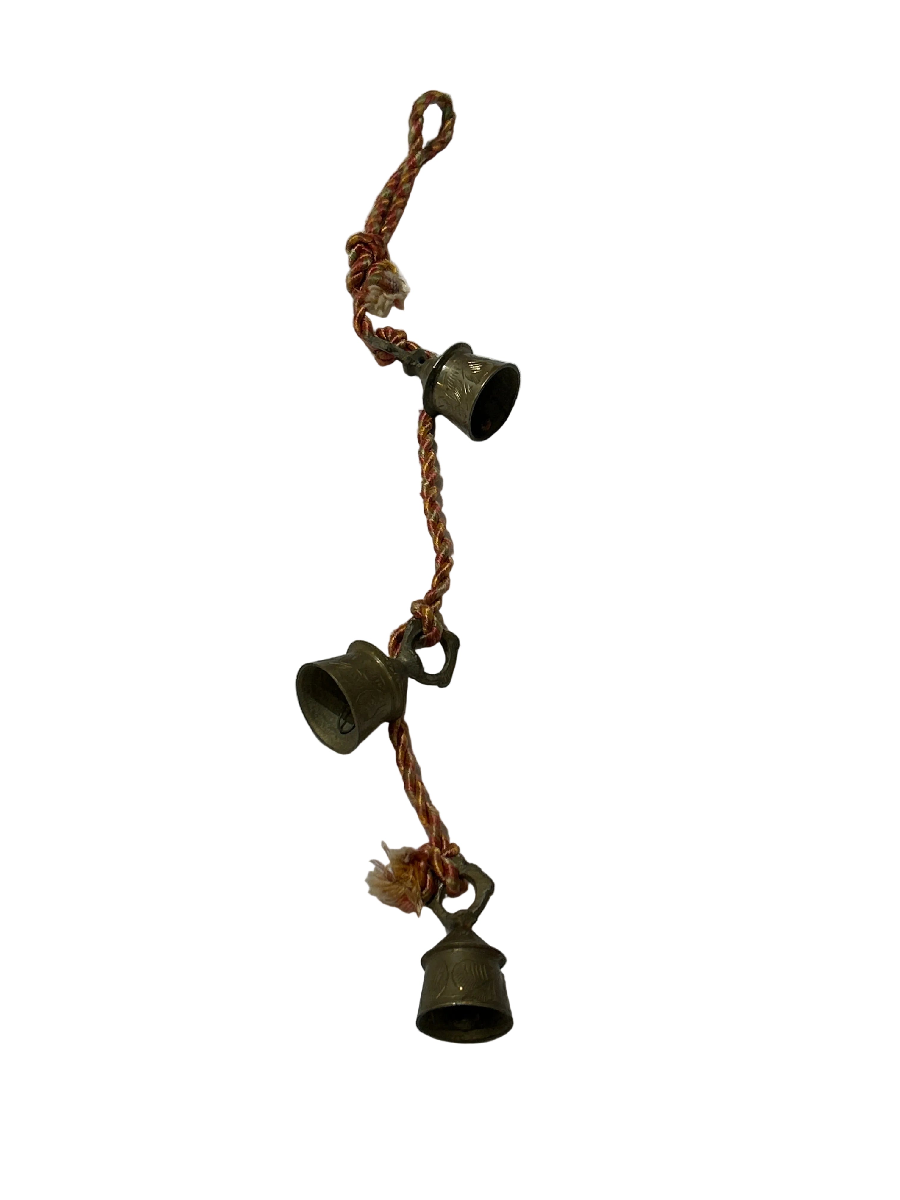 Vintage brass bells on orange cord