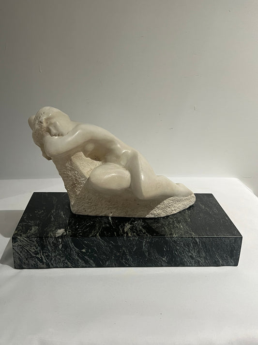 Female statue on Marble base