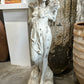 White concrete statue of woman