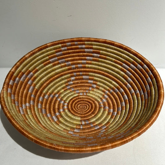 Vintage hand woven orange spiral basket