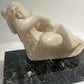 Female statue on Marble base