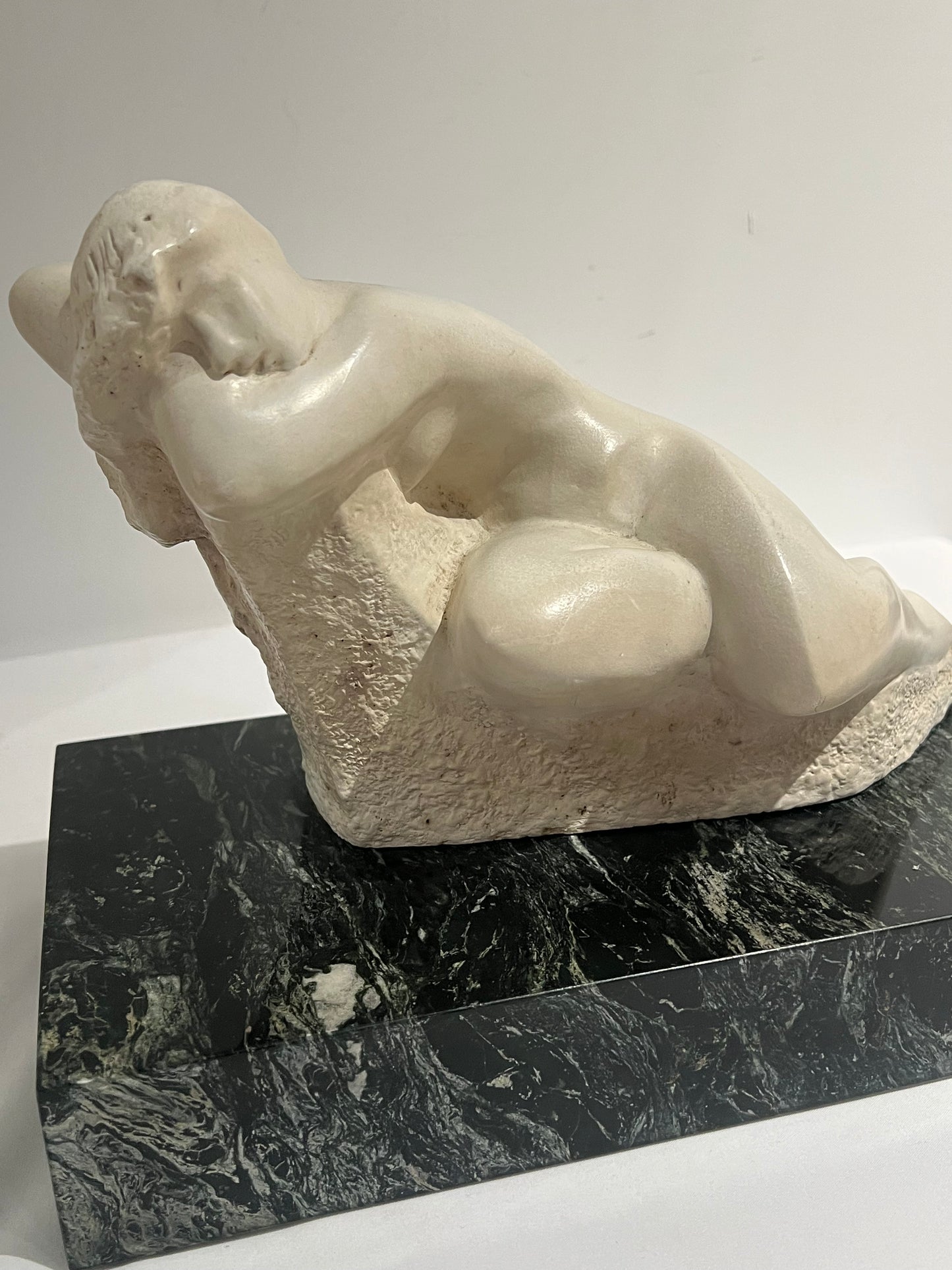 Female statue on Marble base