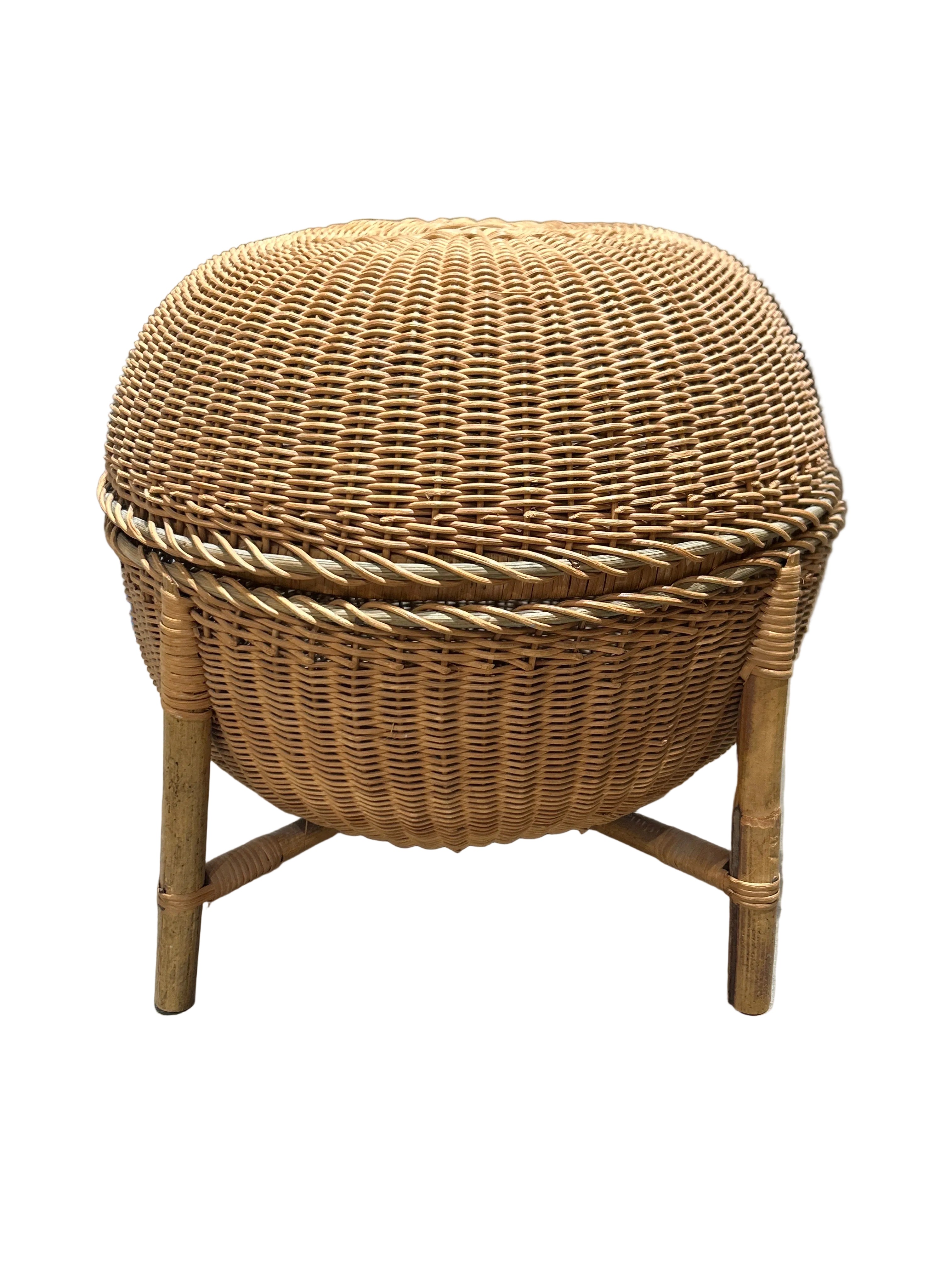 Vintage four-legged wicker basket with lid