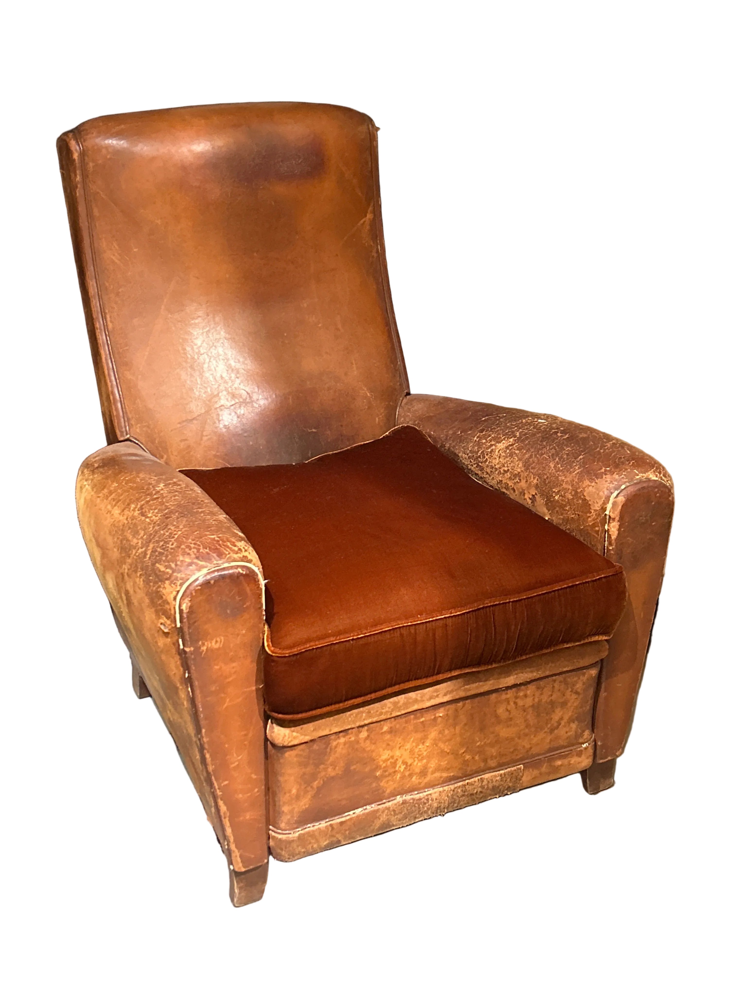 Vintage leather club chair with velvet seat