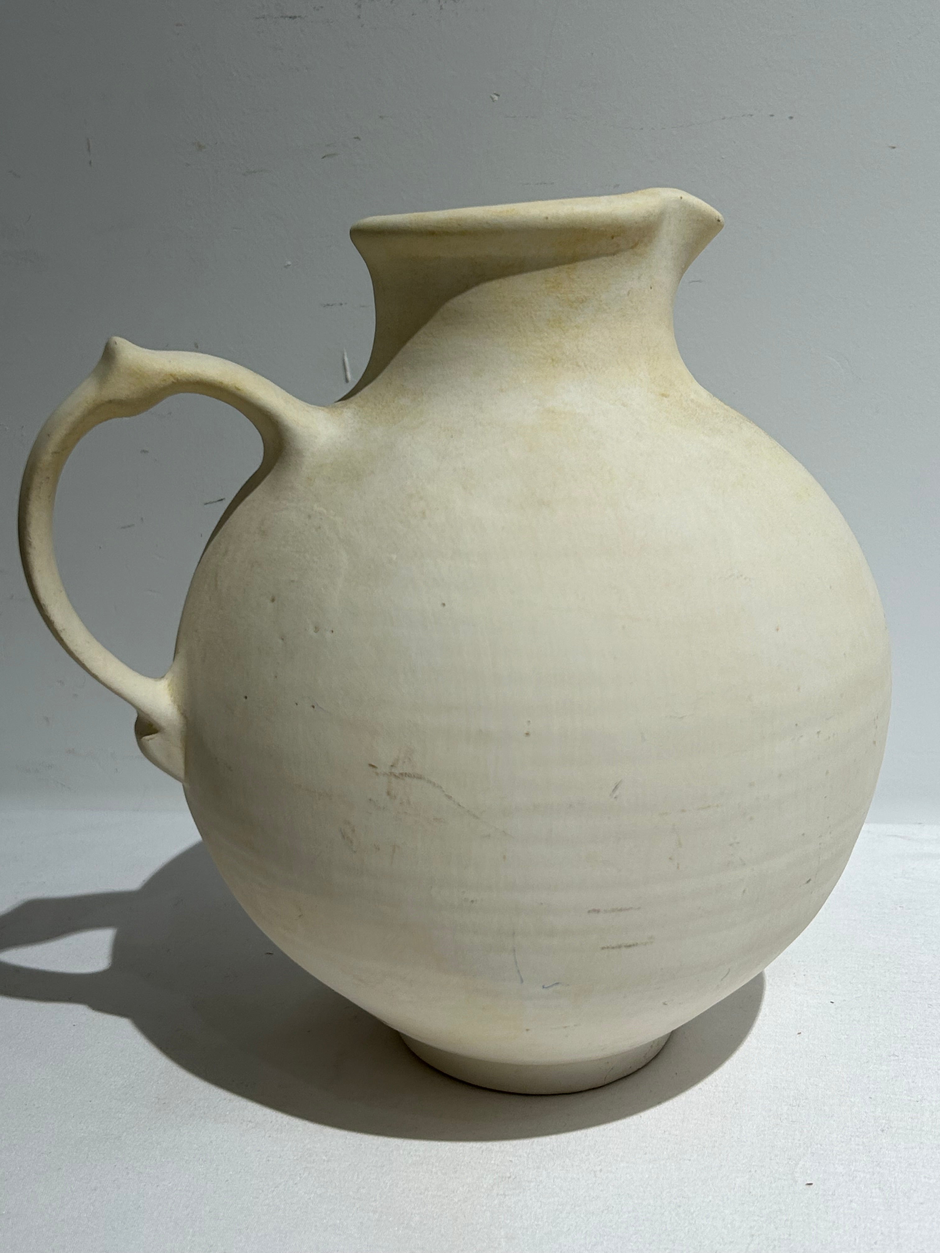 Vintage handled ceramic pitcher