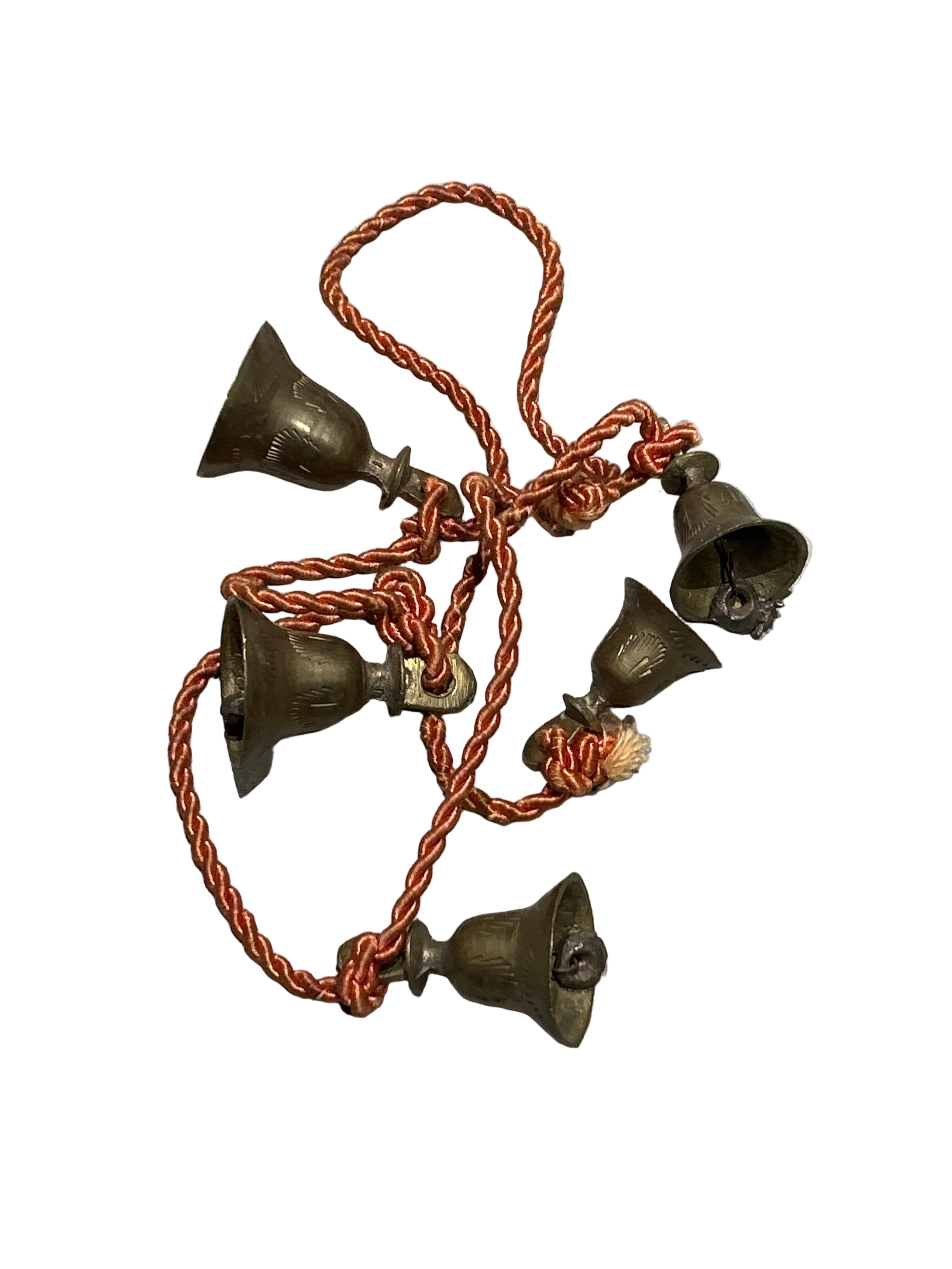 Vintage engraved bells on orange cord