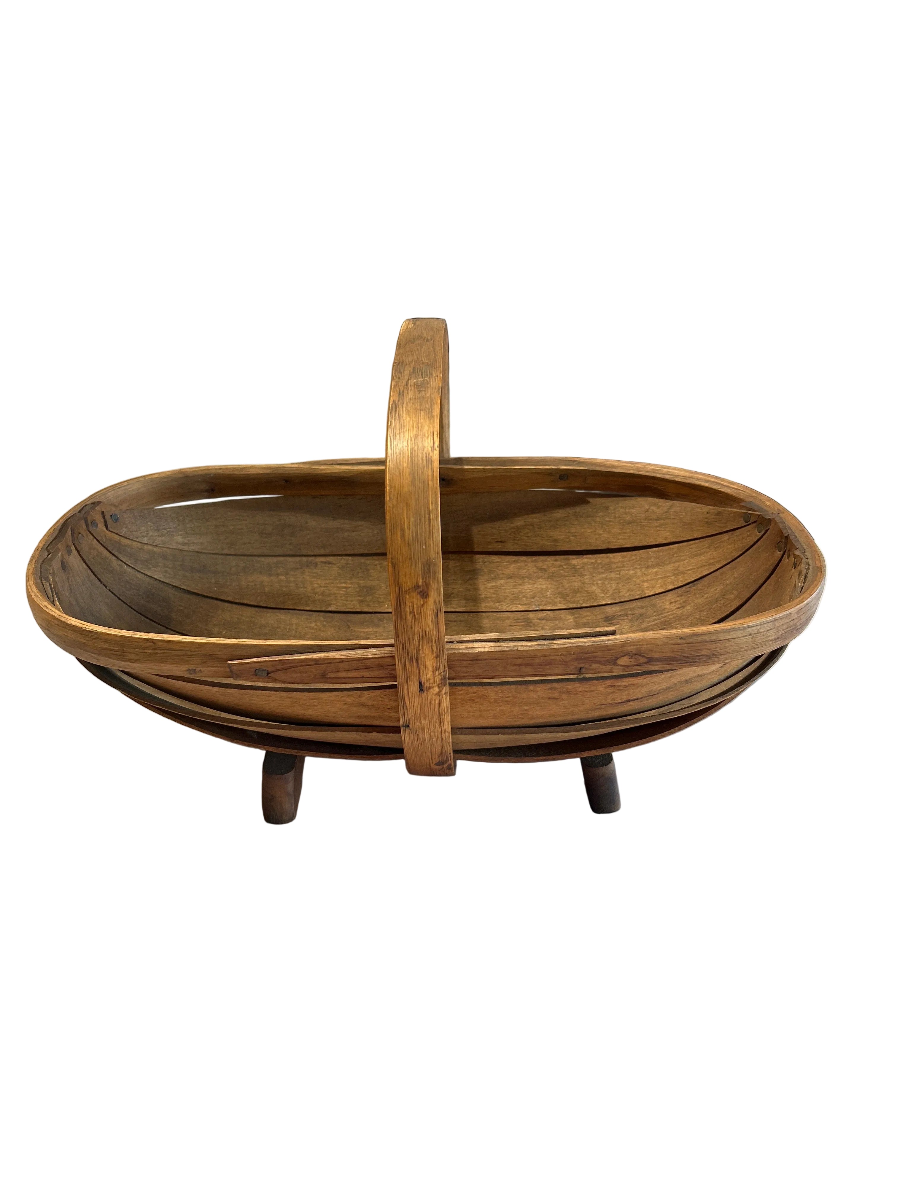 Vintage footed wood basket