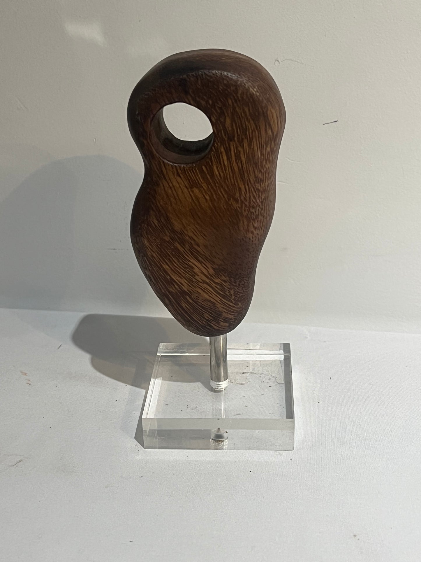 Wooden object on stand