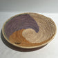 Woven basket with brown and purple