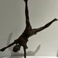 Vintage boy mid cartwheel statue