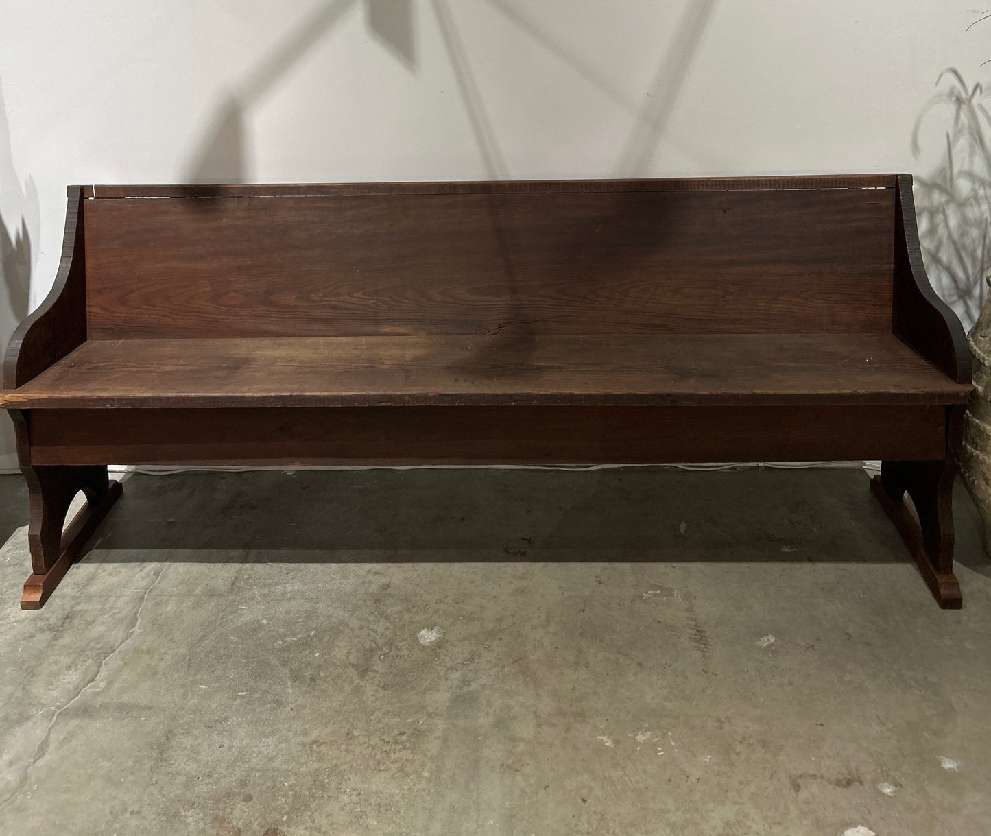 Dark bench with back