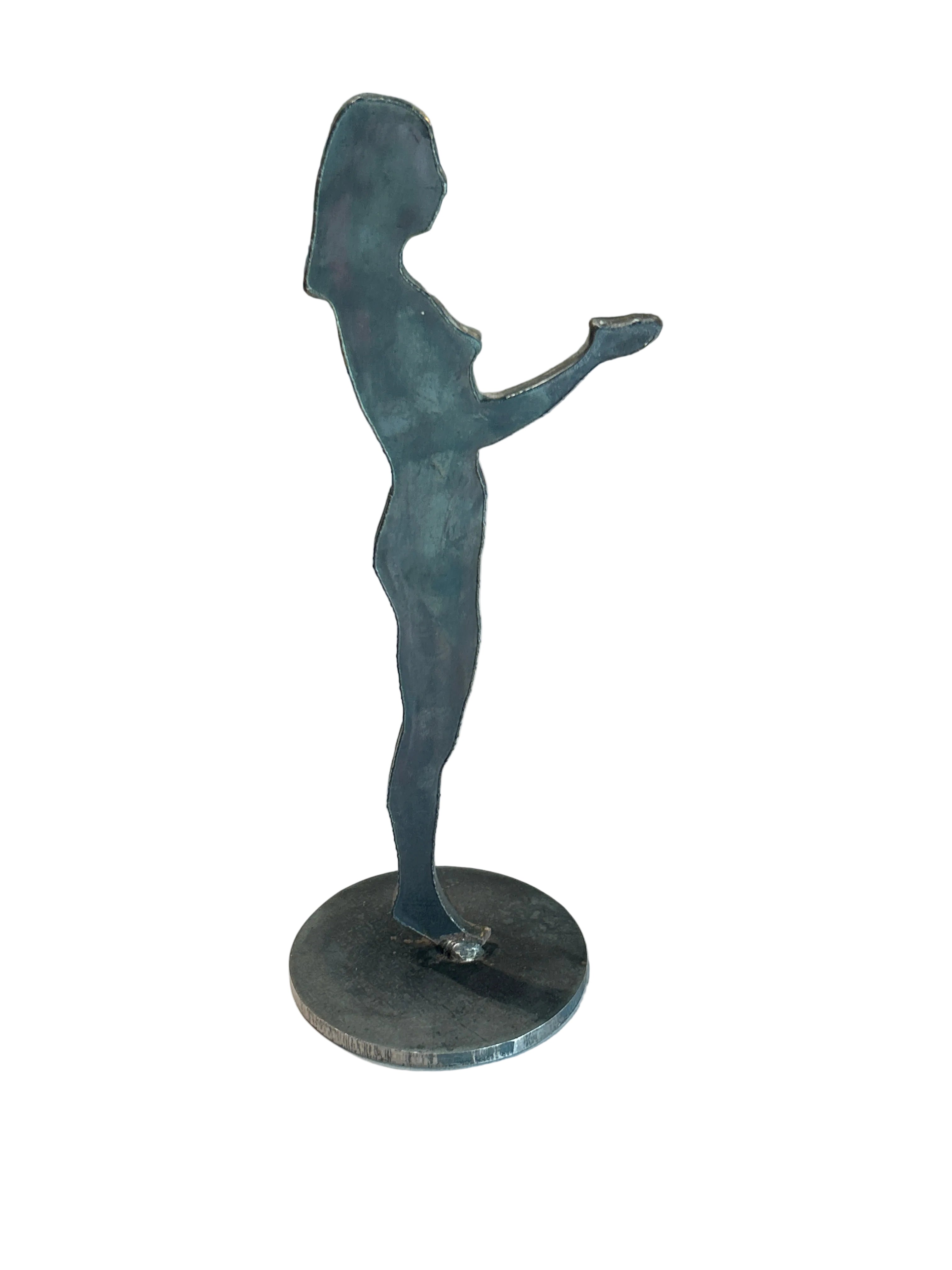 Vintage folk art metal sculpture