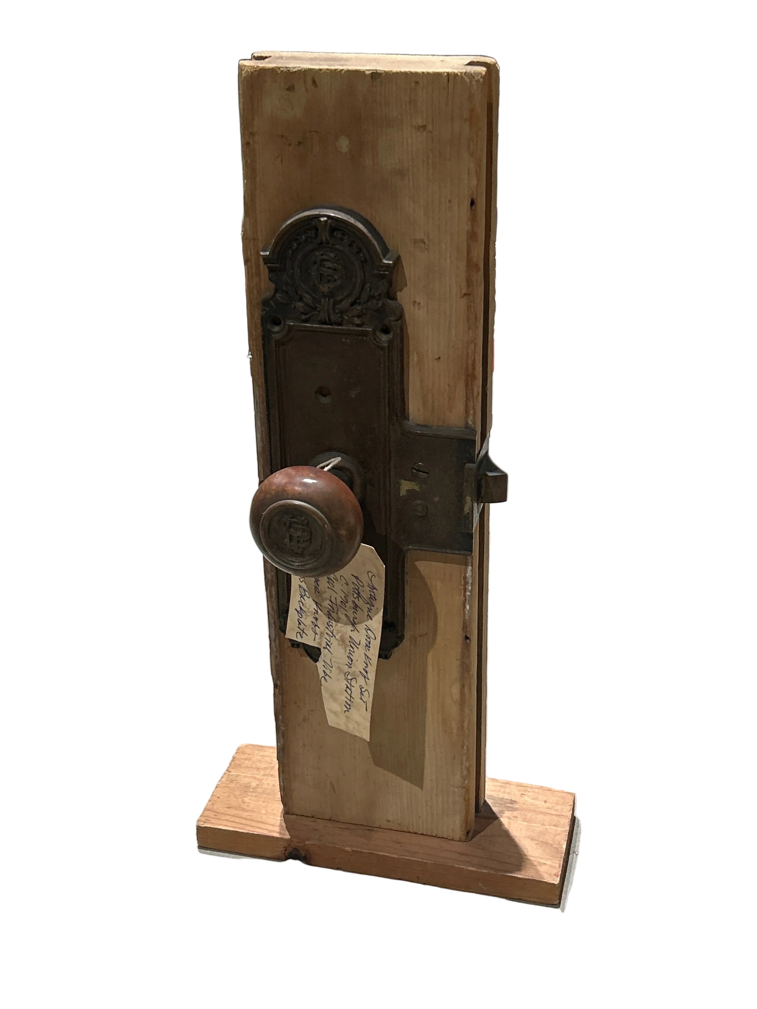 Vintage doorknob set with copper knobs and brass backplate