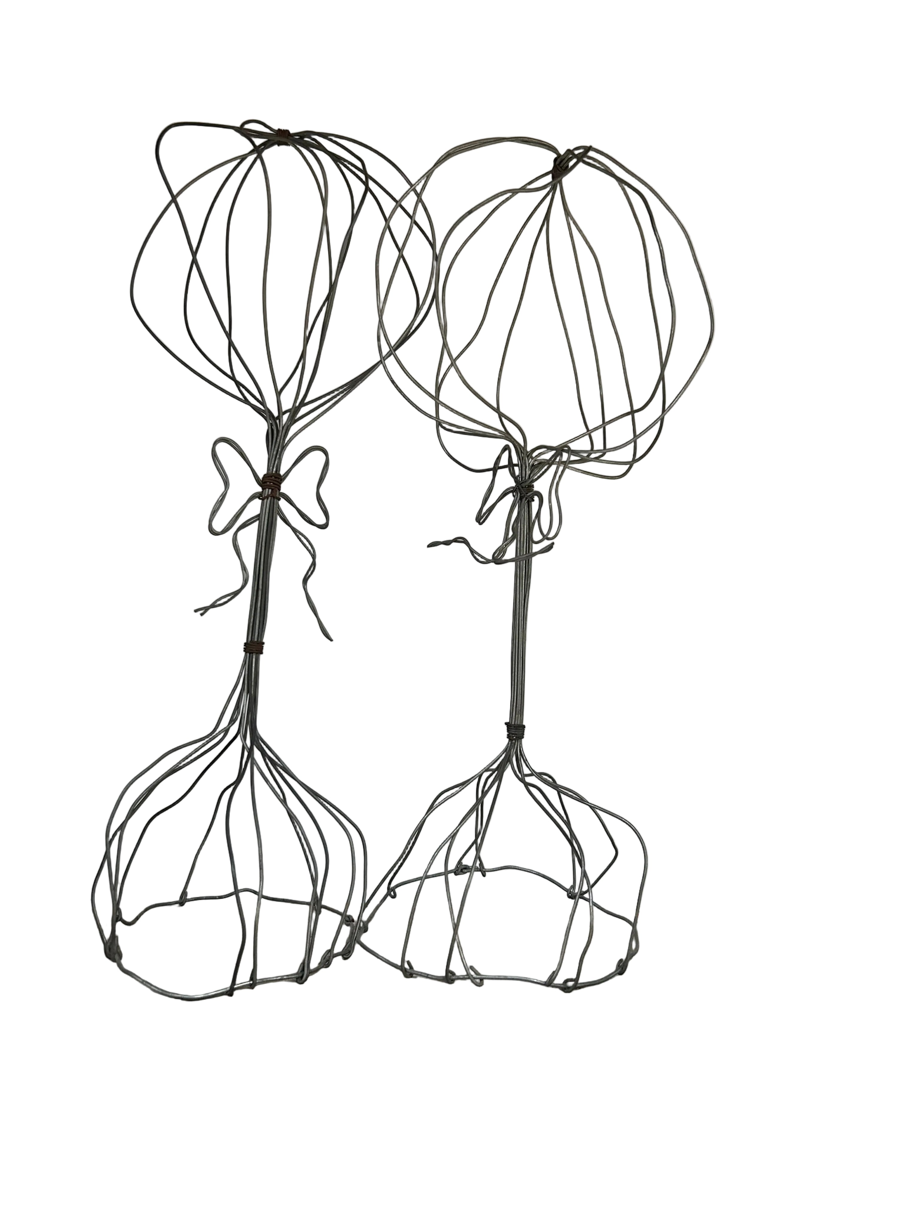 Vintage pair of wired sculptures with bows