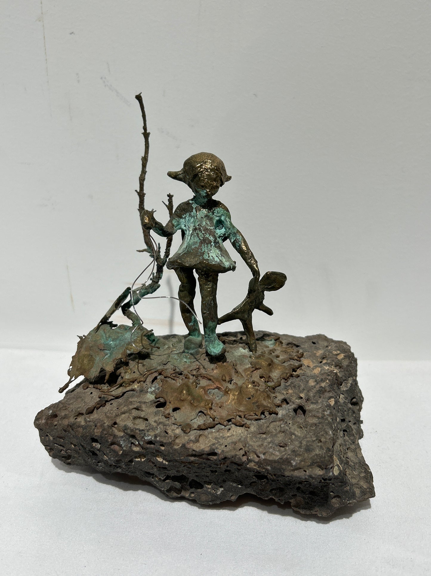 Vintage metal sculpture of girl