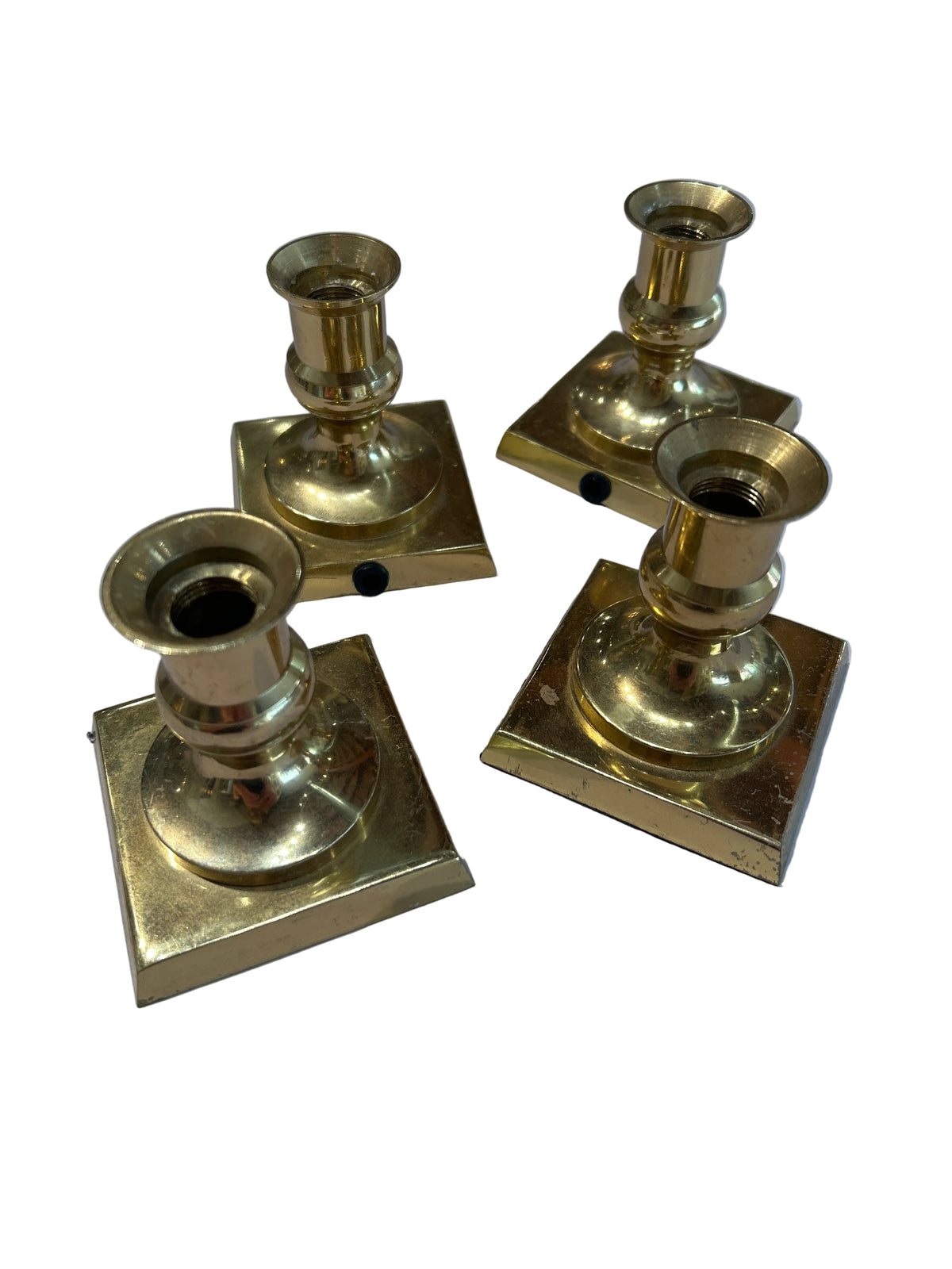Vintage set of 4 brass footed candle holders