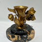 Vintage gilded rose candleholder on marble