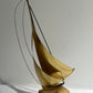 Brass sailboat on marble base