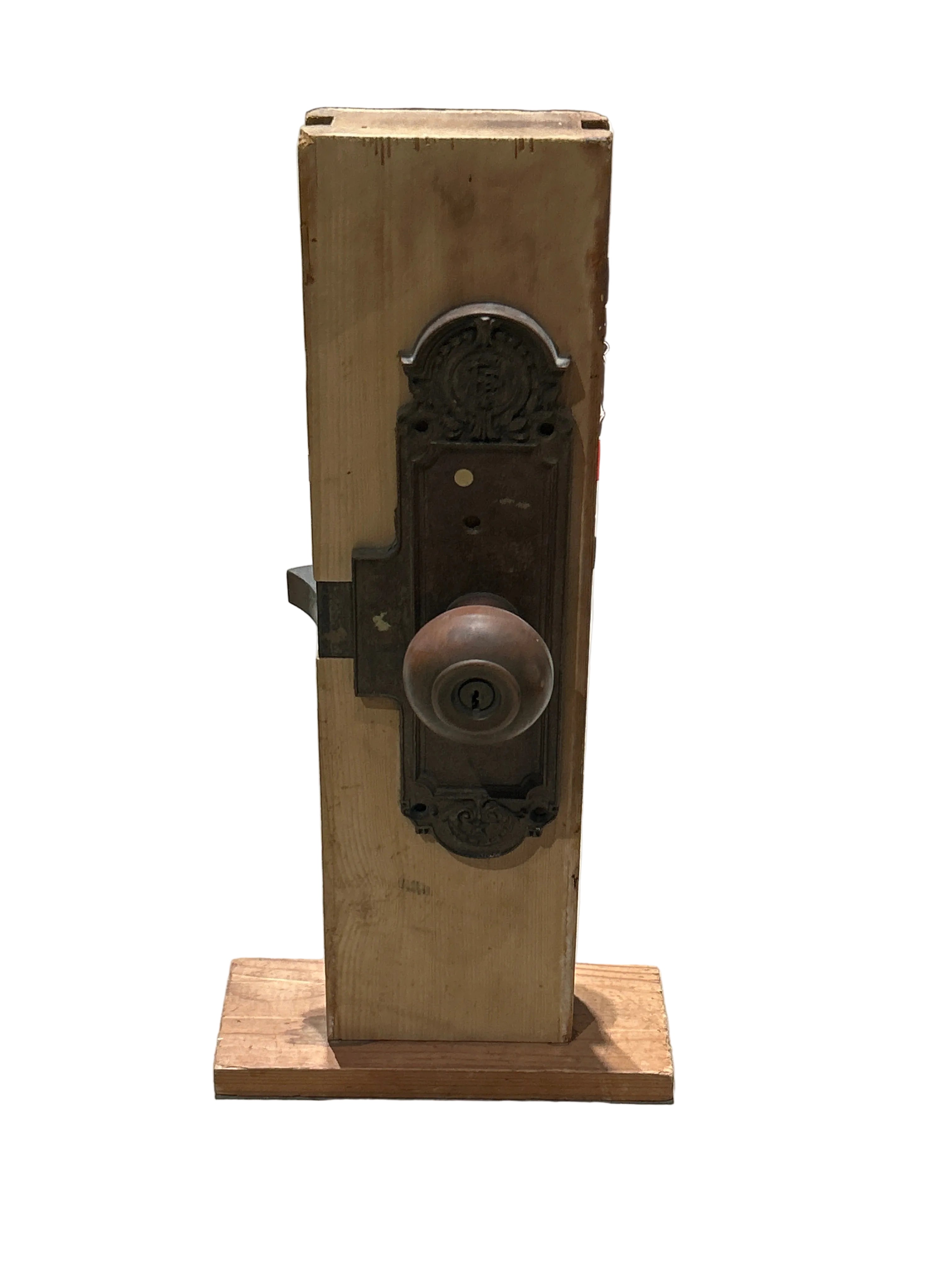 Vintage doorknob set with copper knobs and brass backplate