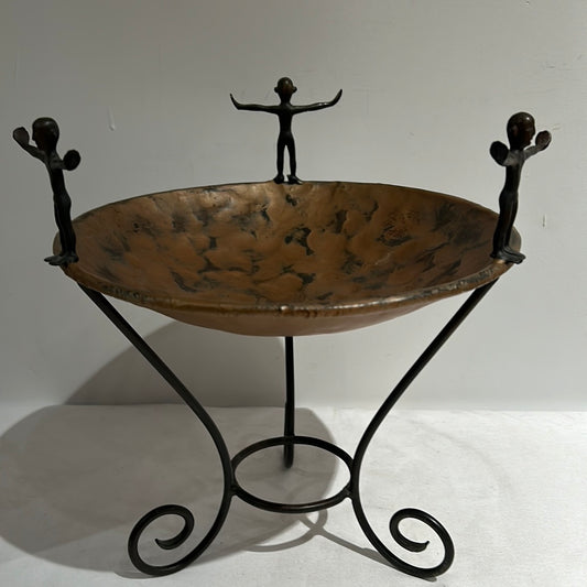 Decorative wrought iron bowl on stand