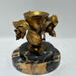 Vintage gilded rose candleholder on marble