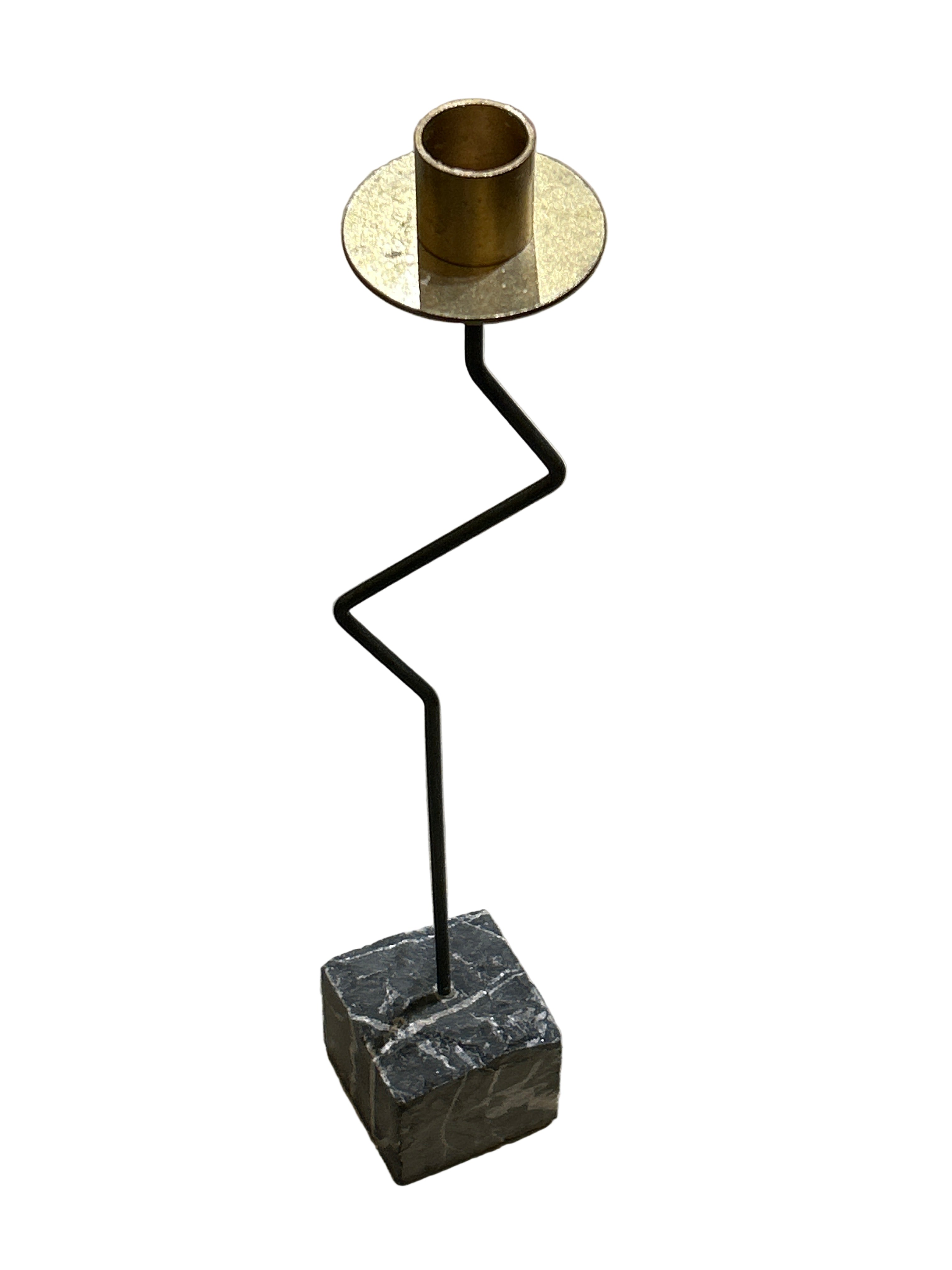 Vintage metal candle holder on stone base