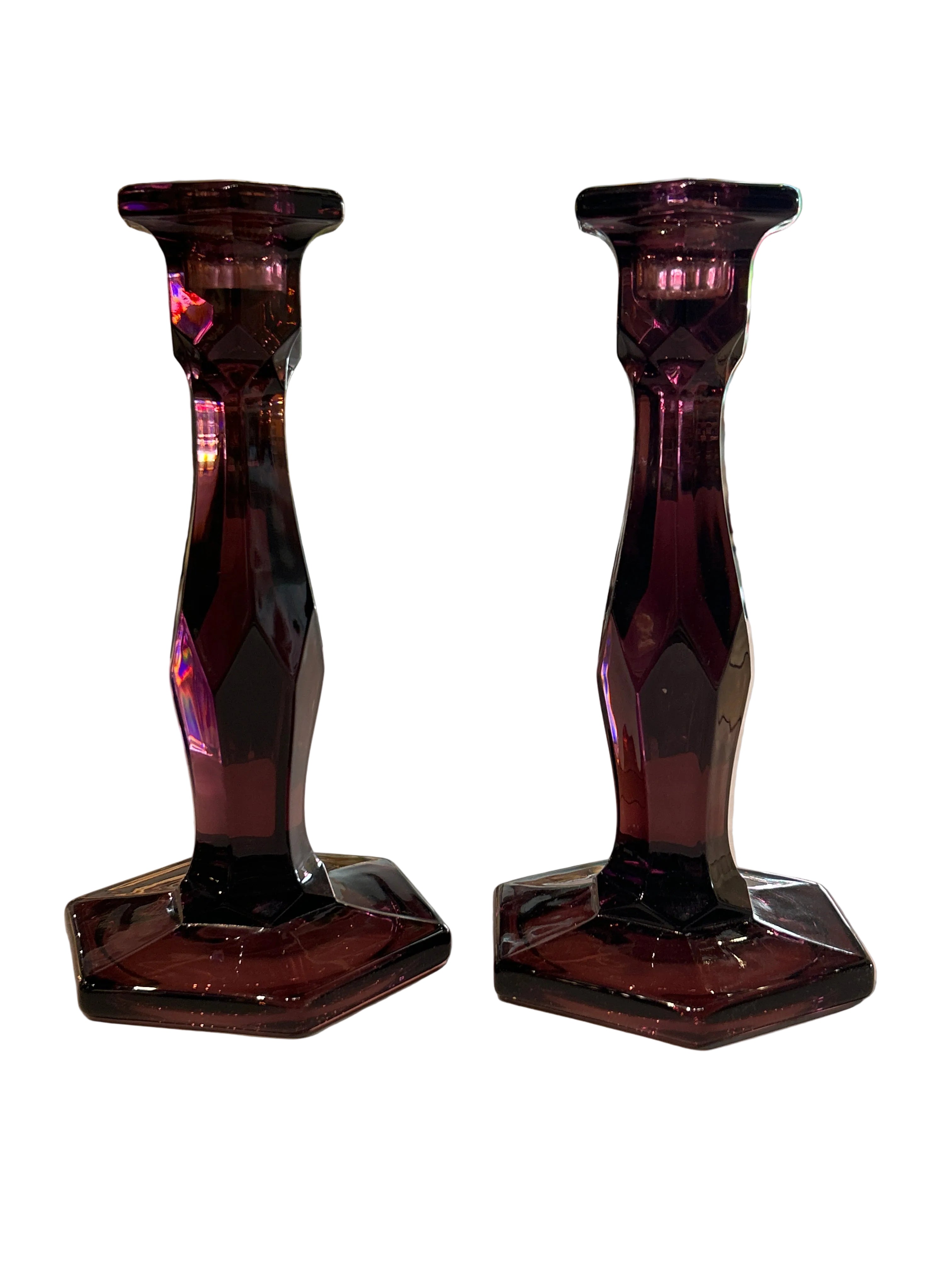 Vintage pair of amethyst glass candleholders