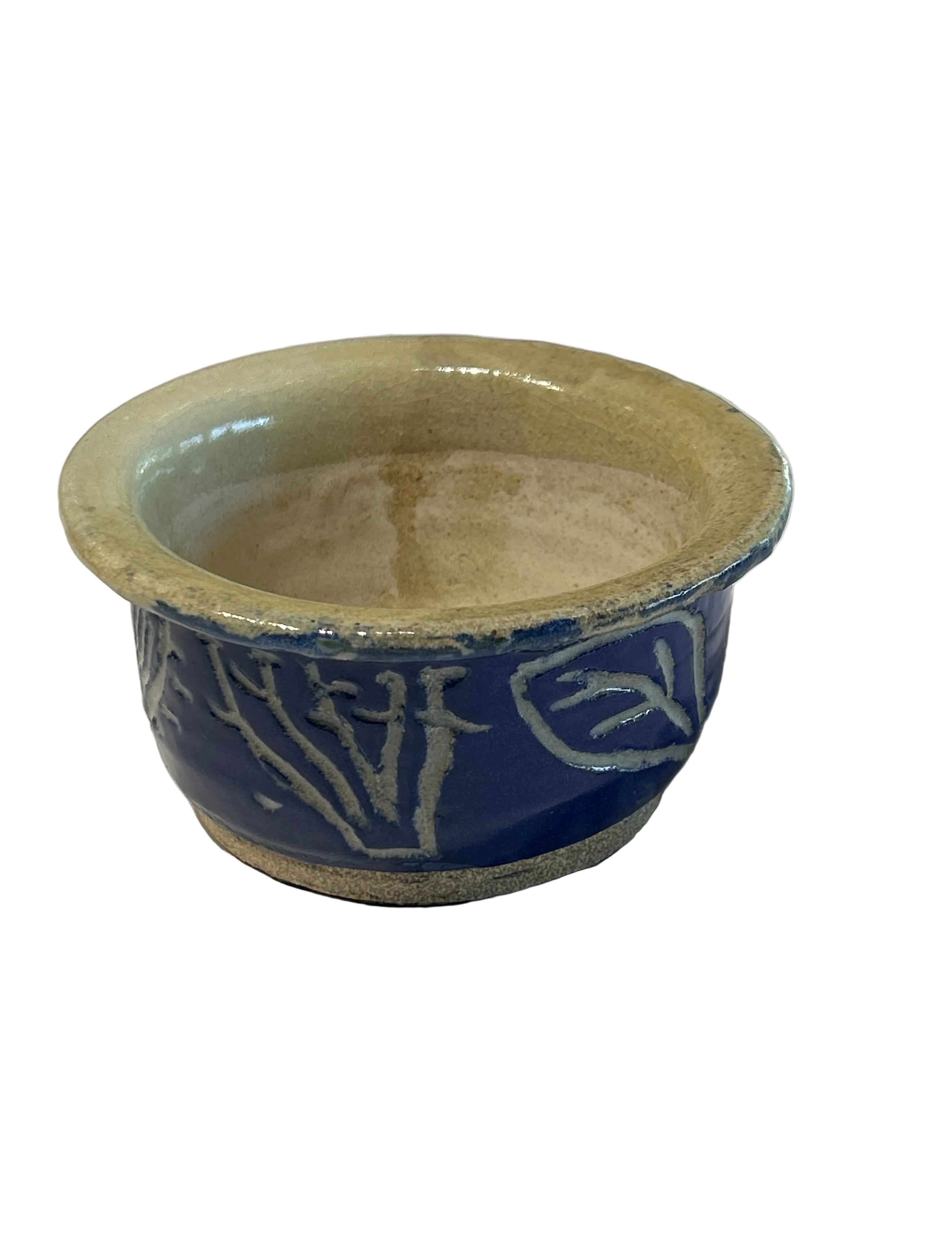 Vintage engraved blue ceramic bowl