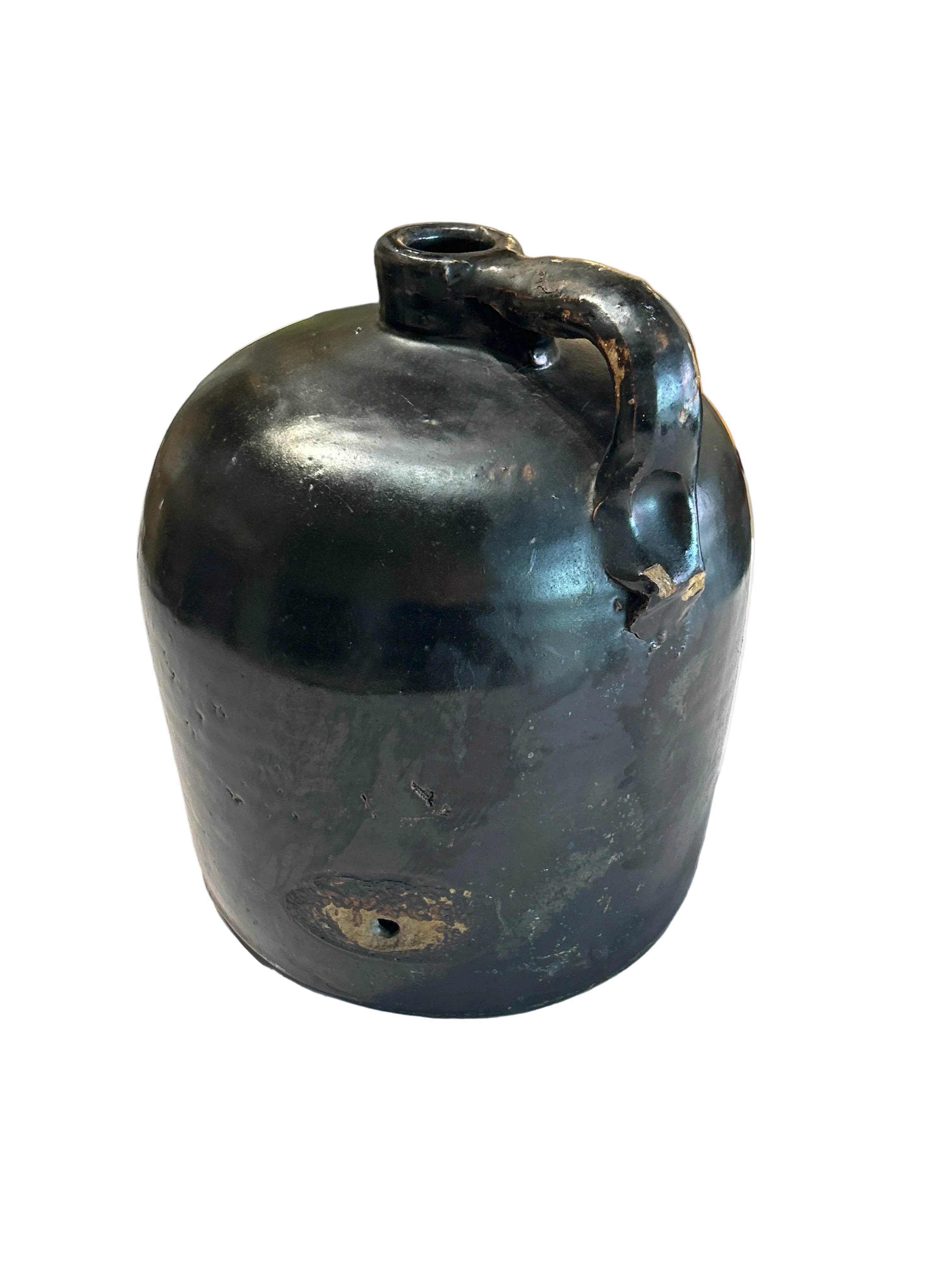 Vintage black stoneware whiskey jug
