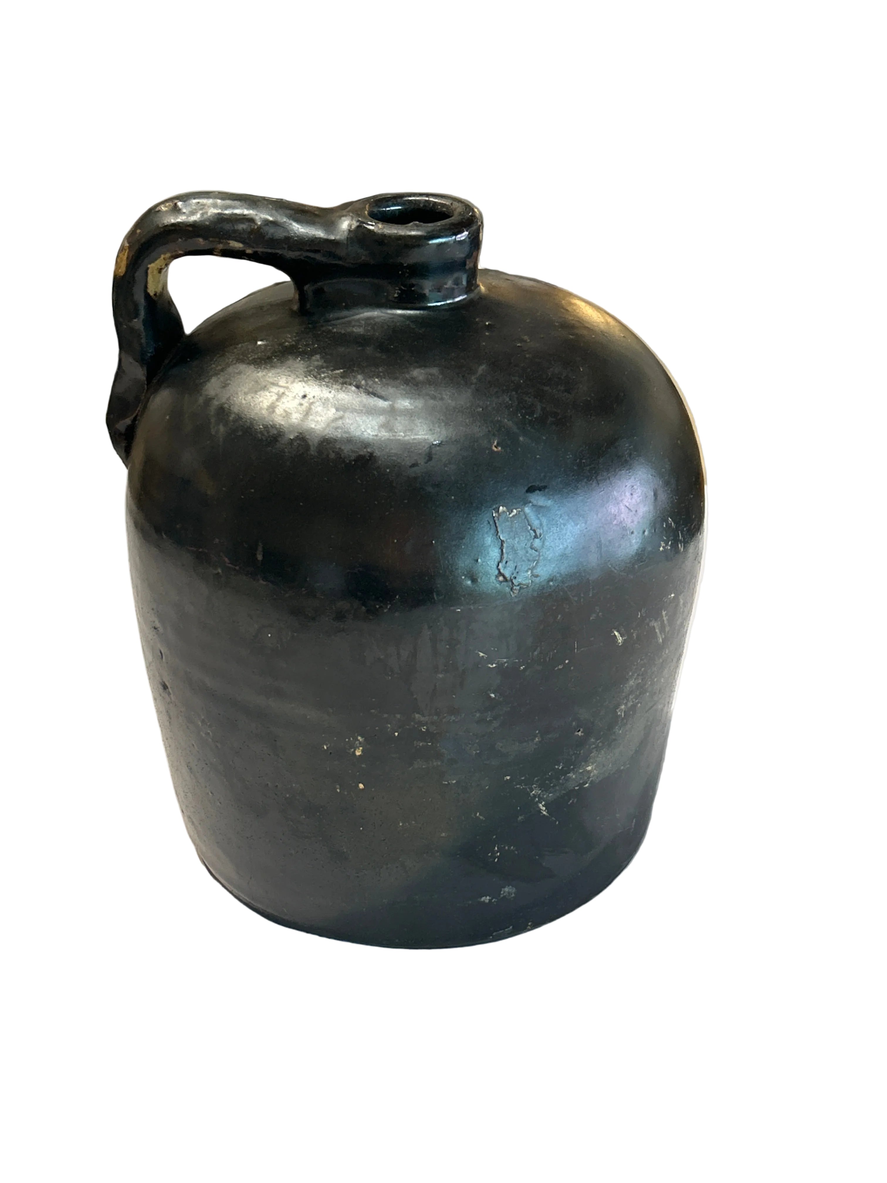 Vintage black stoneware whiskey jug