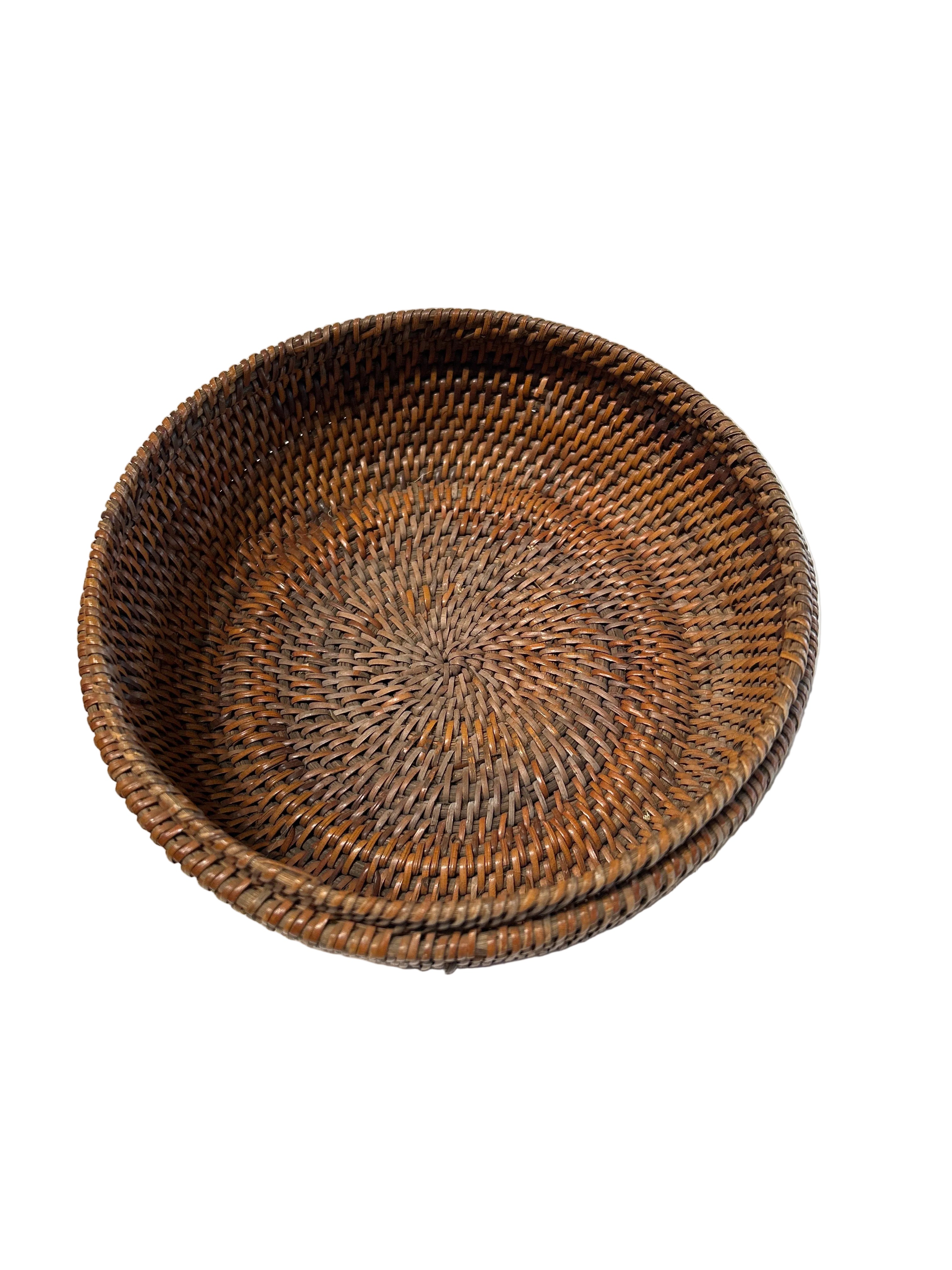 Vintage Asian rattan lidded basket with tassel