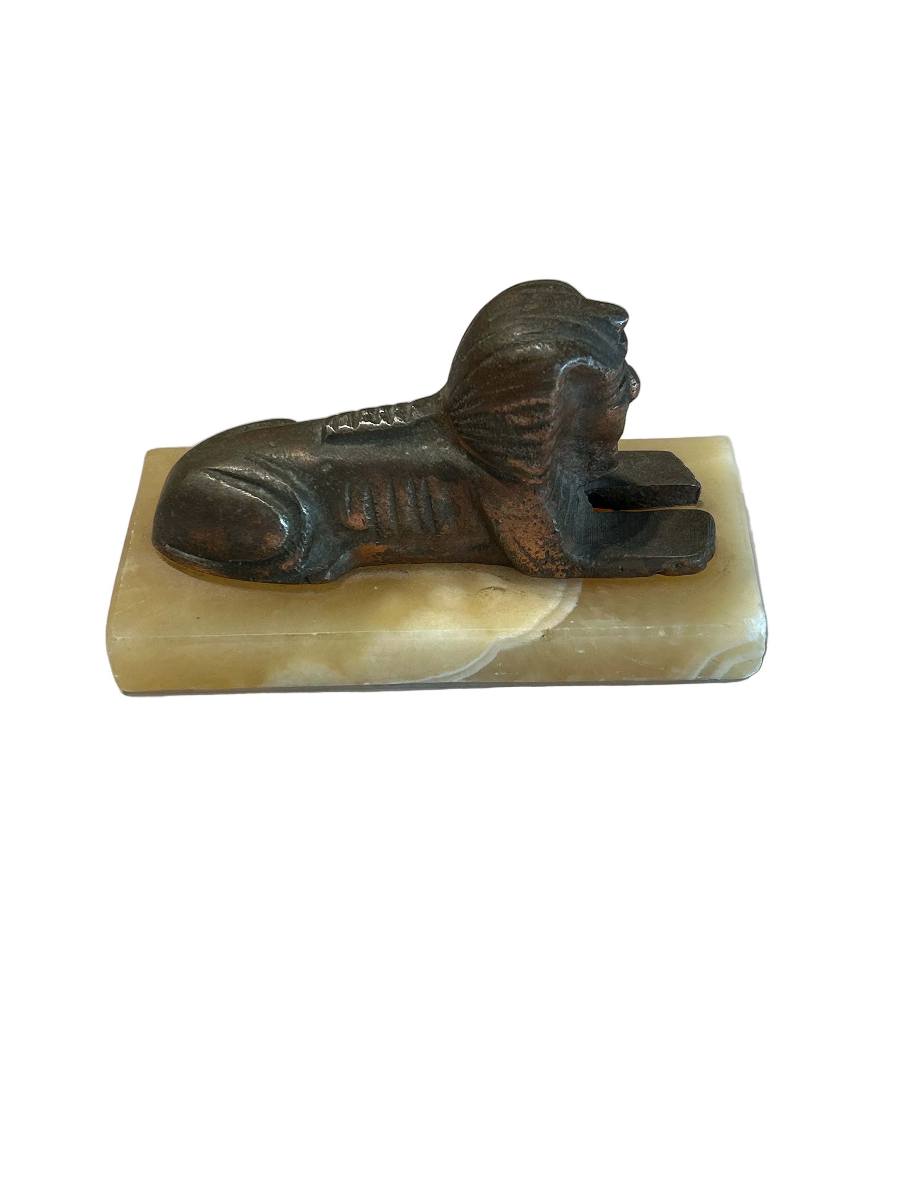Vintage copper pharaoh figurine on onyx base