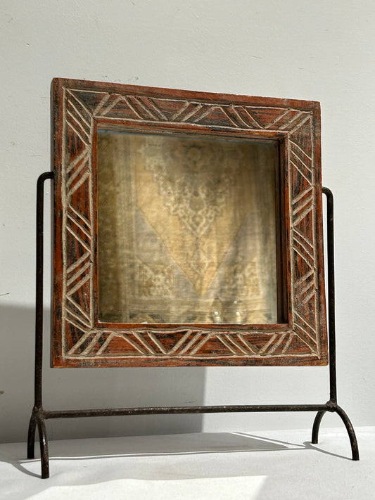 Vintage carved mirror on stand