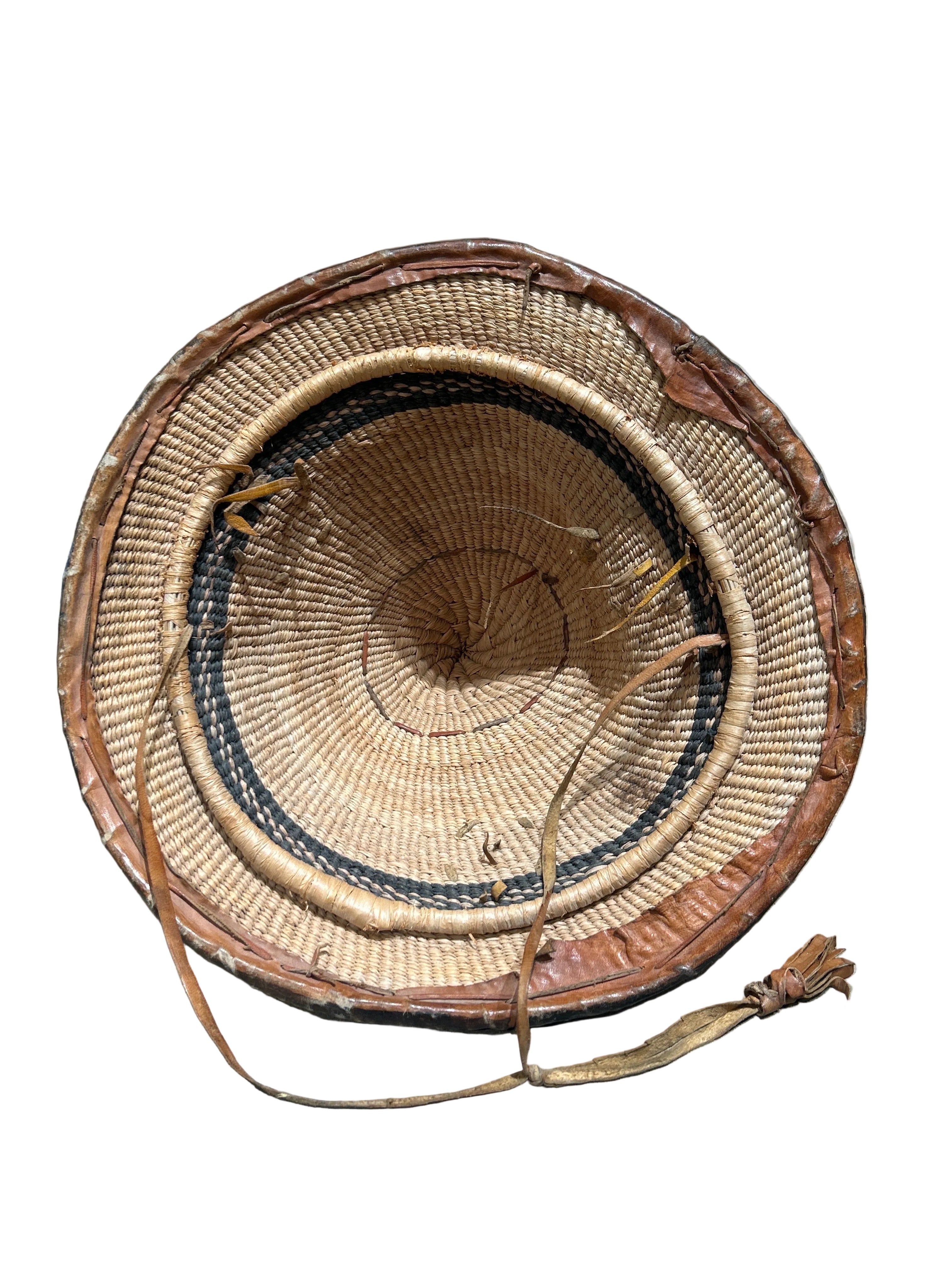 Vintage African leather & straw hat