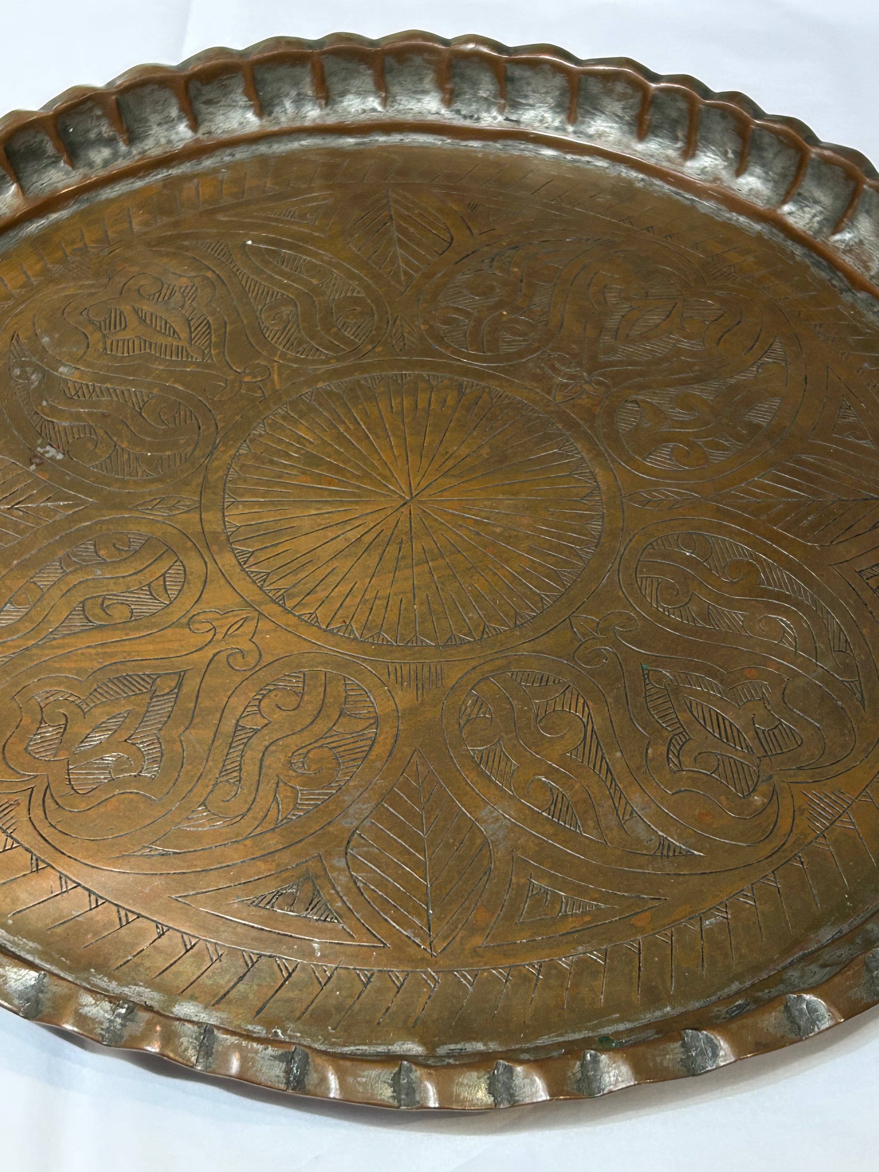 Vintage engraved copper tray with crest edges