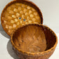 Woven lidded basket with wood bird