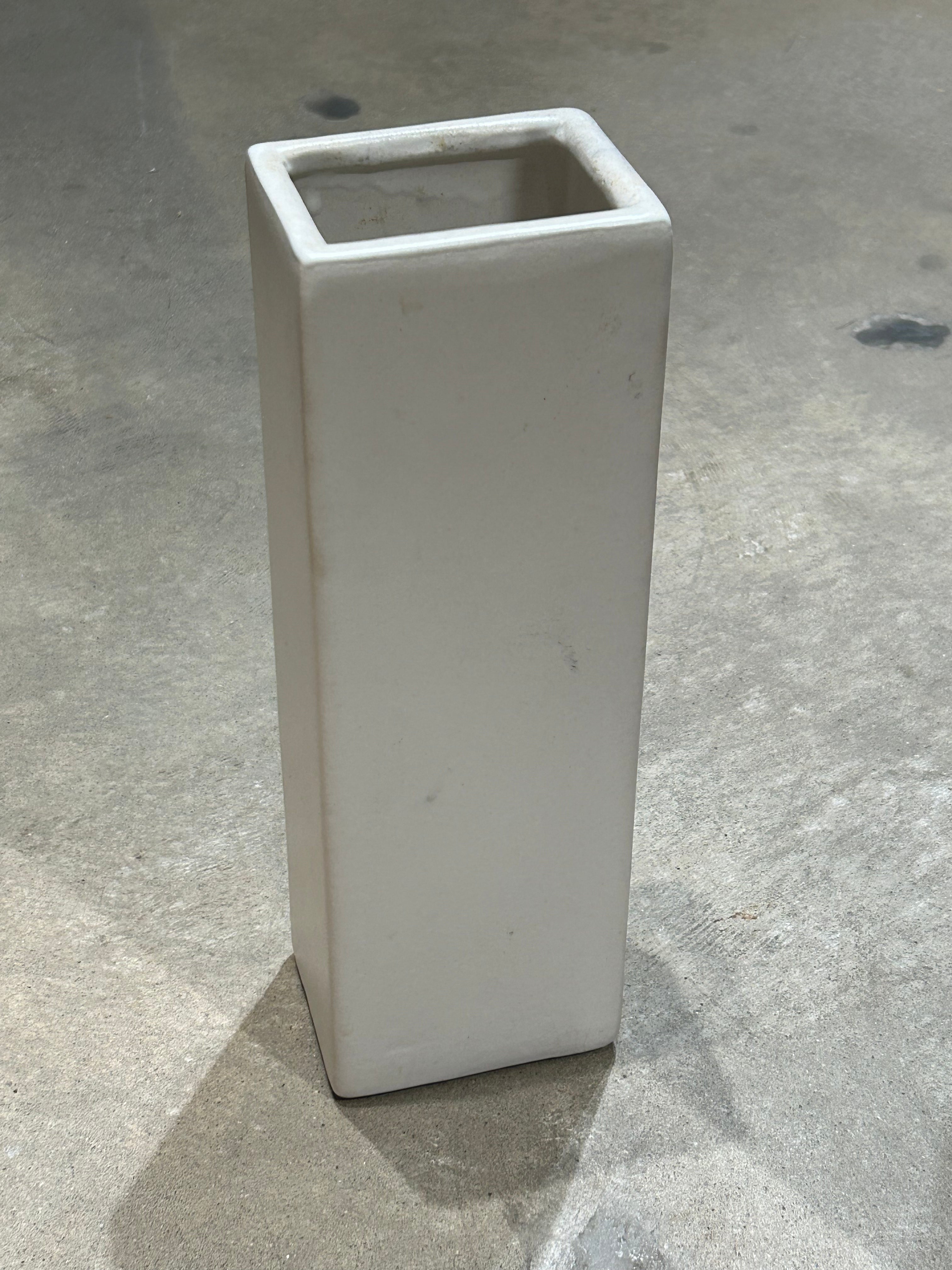 Vintage pottery vessel with painted female figure