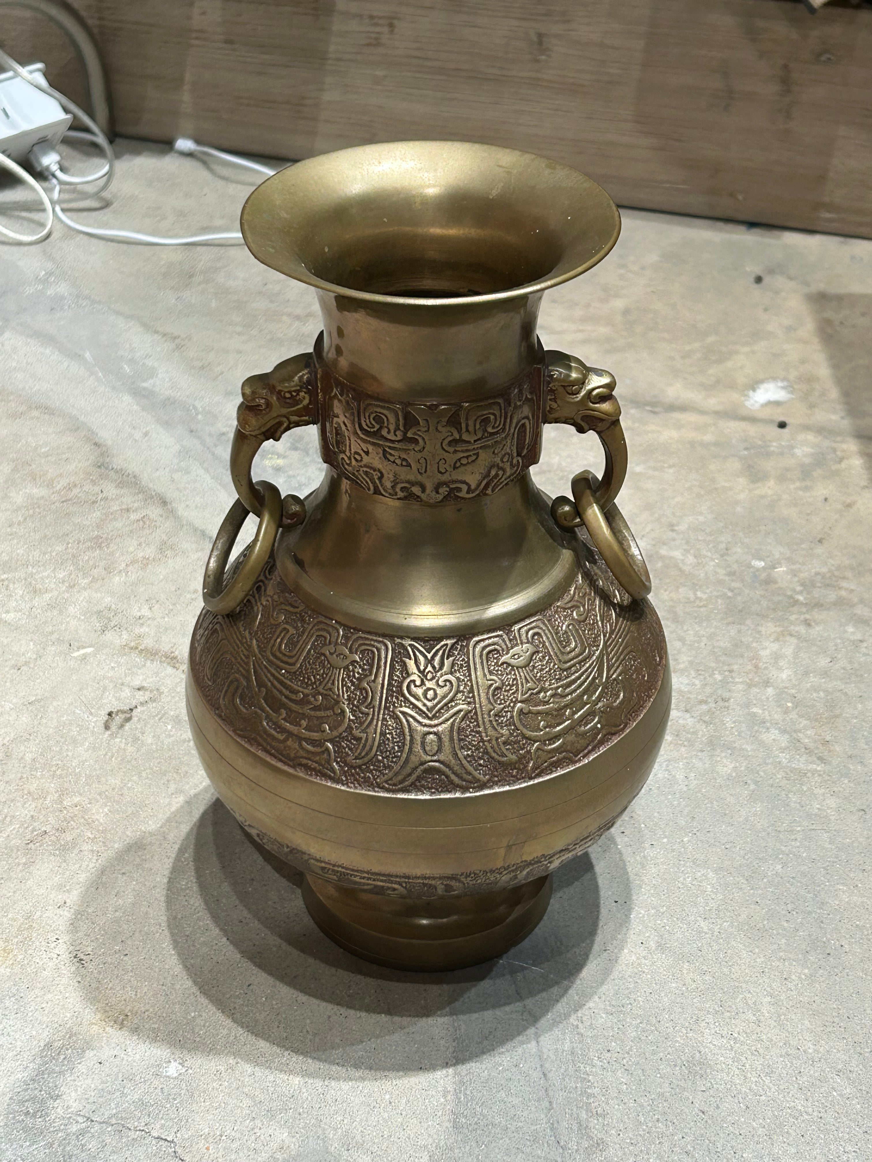 Vintage two handled embossed brass urn
