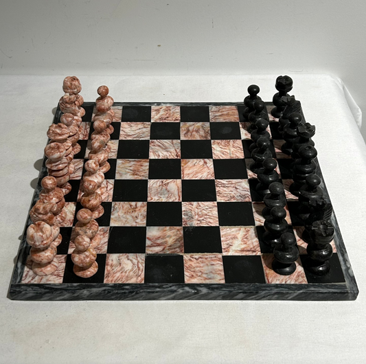 Vintage pink and black marble chess set