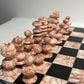 Vintage pink and black marble chess set