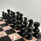 Vintage pink and black marble chess set