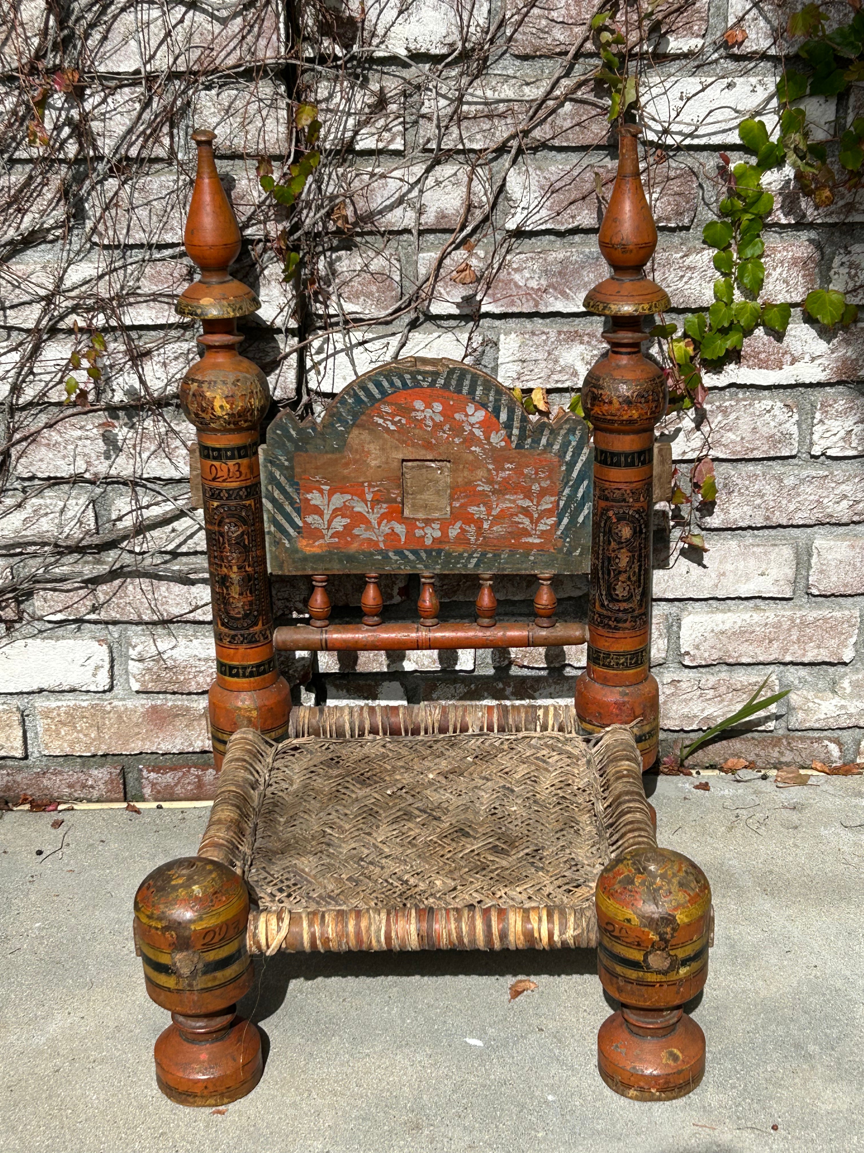Vintage hand painted tribal chair