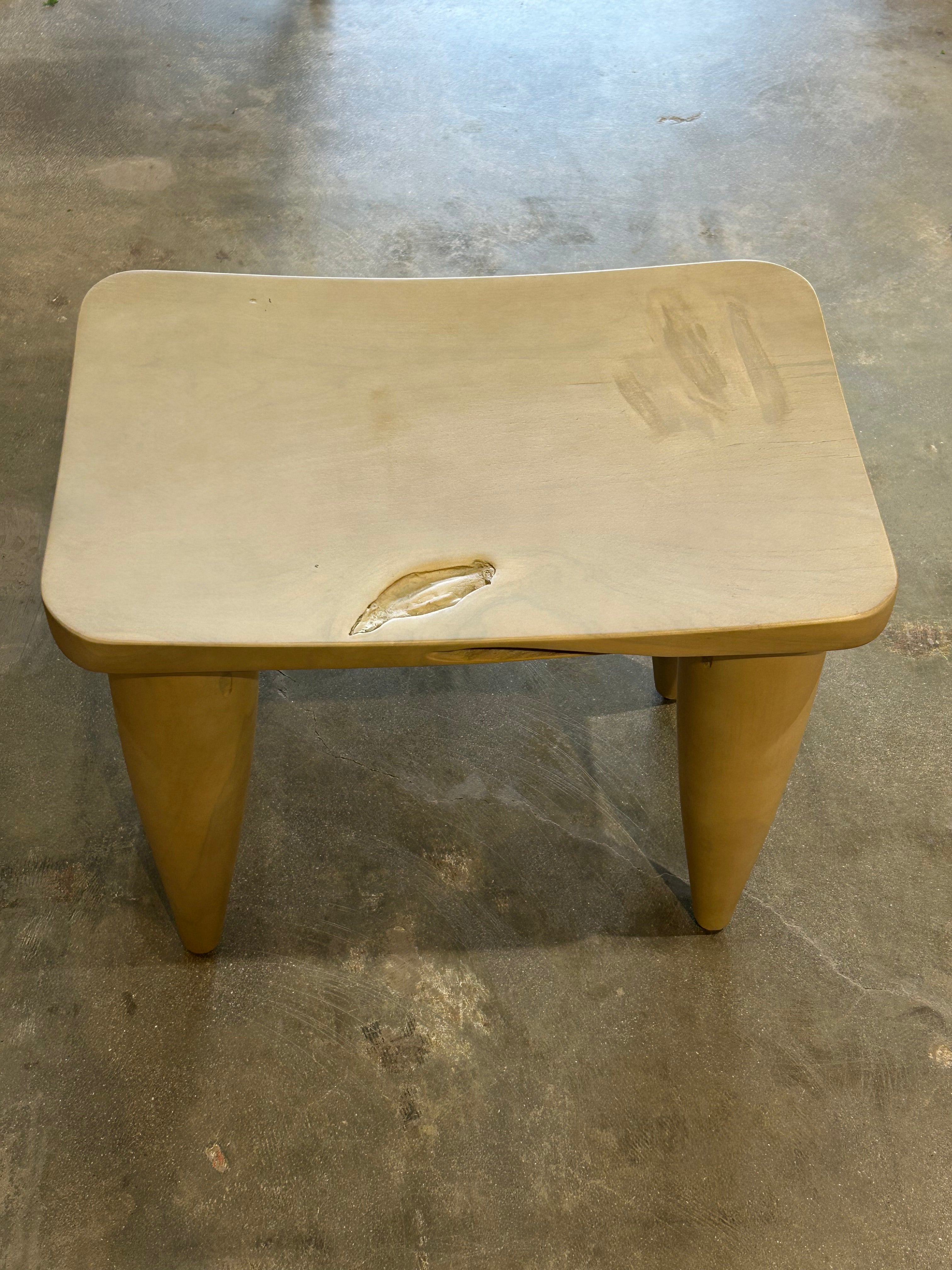Light colored wood stool